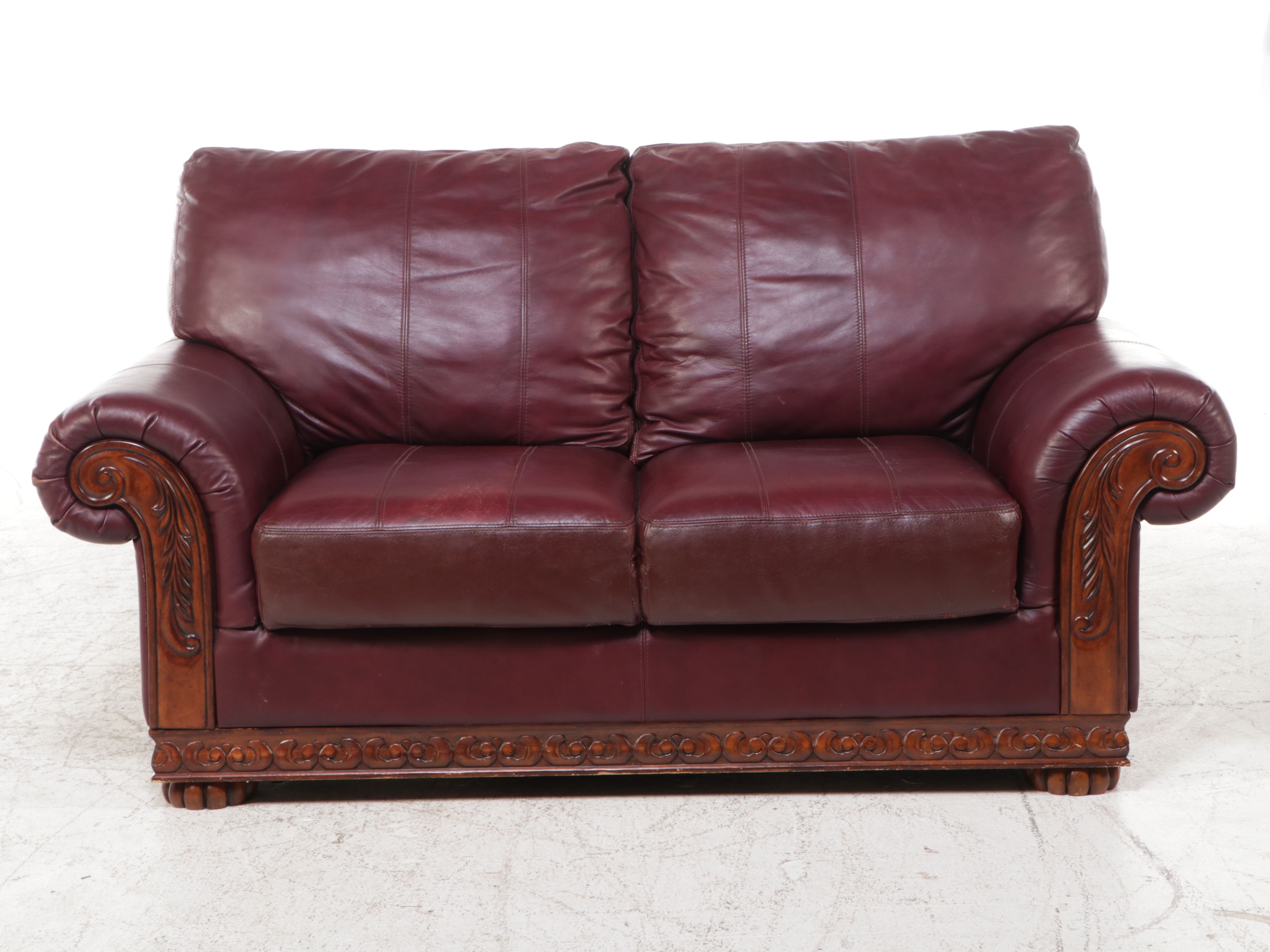 Carved Wooden Frame and Faux Leather Loveseat