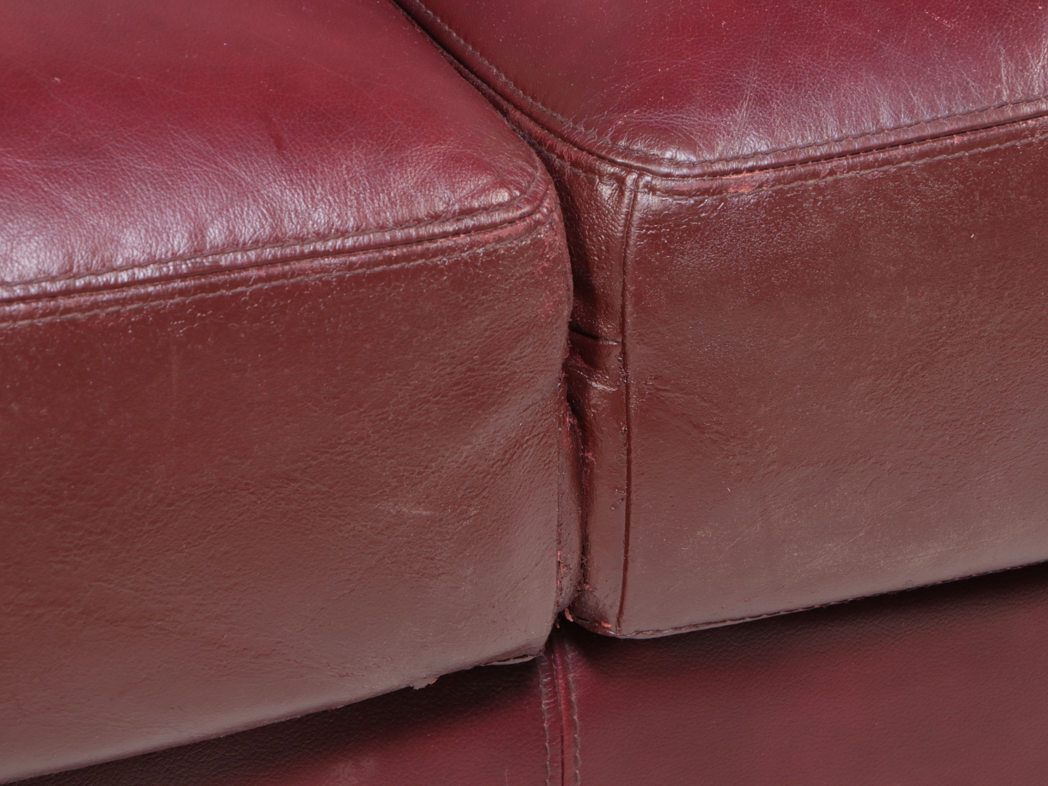 Carved Wooden Frame and Faux Leather Loveseat