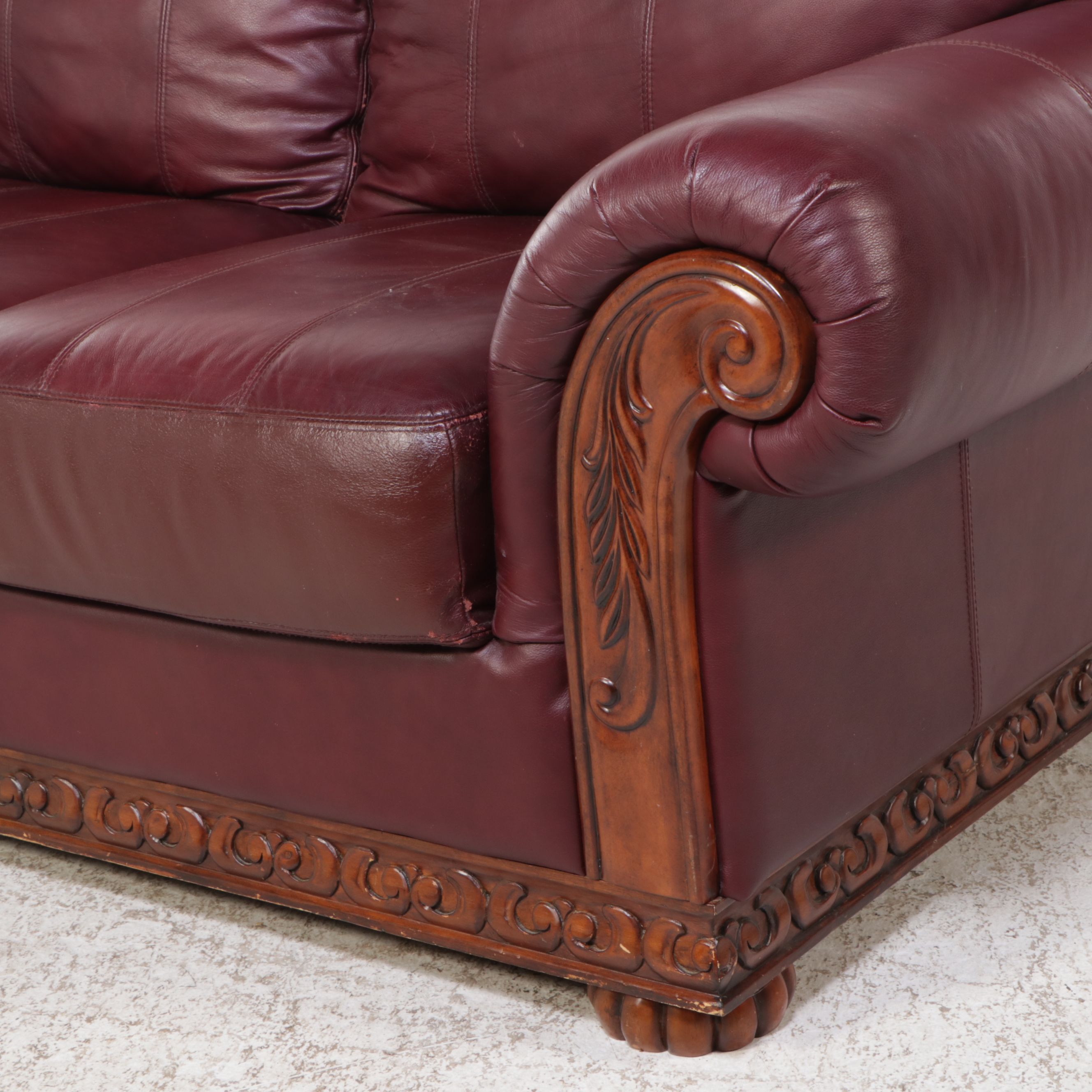 Carved Wooden Frame and Faux Leather Loveseat