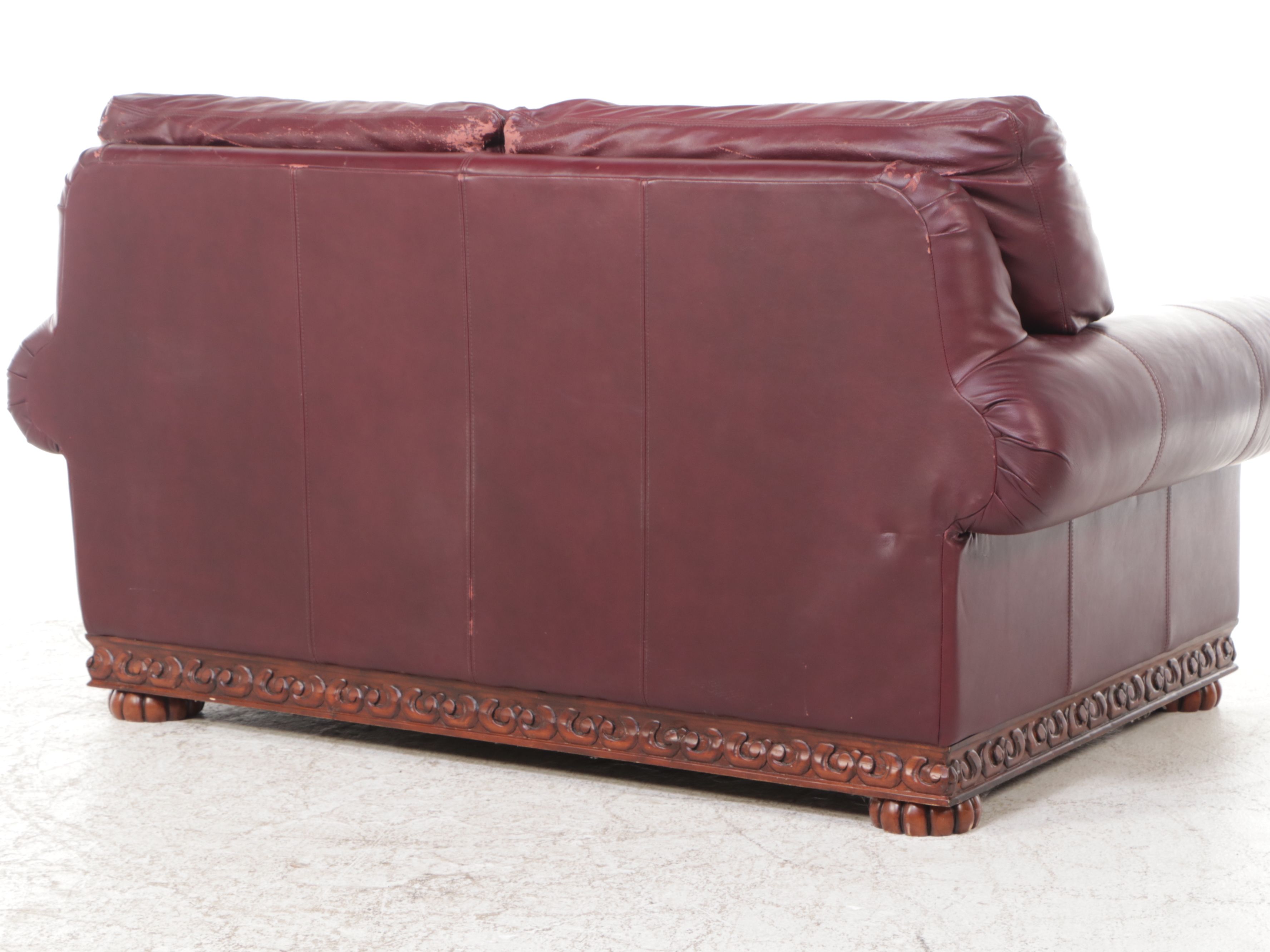 Carved Wooden Frame and Faux Leather Loveseat