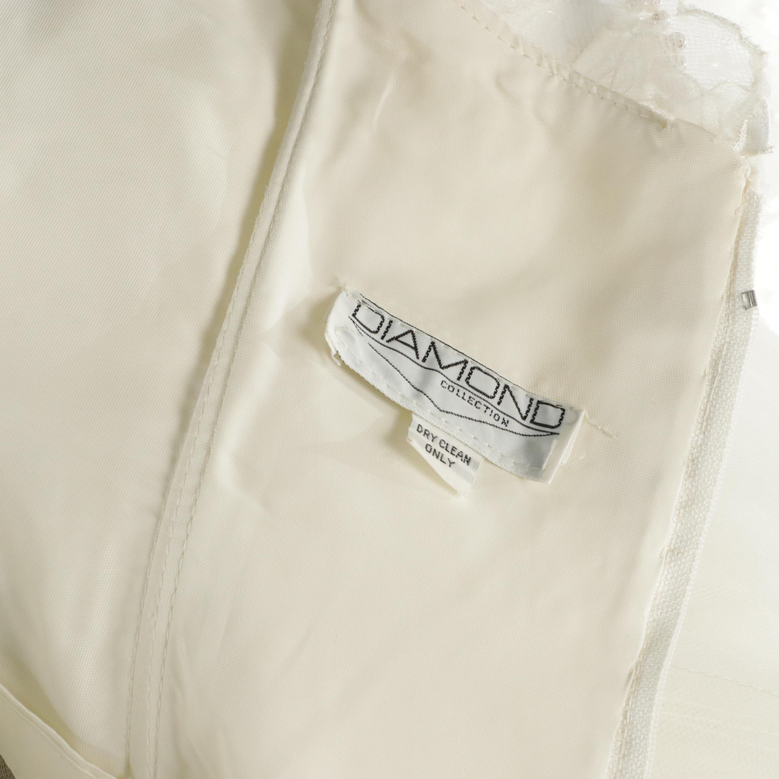 Robert Legere Puff Sleeve Petal Appliqué Chapel Train Snowball Wedding Gown