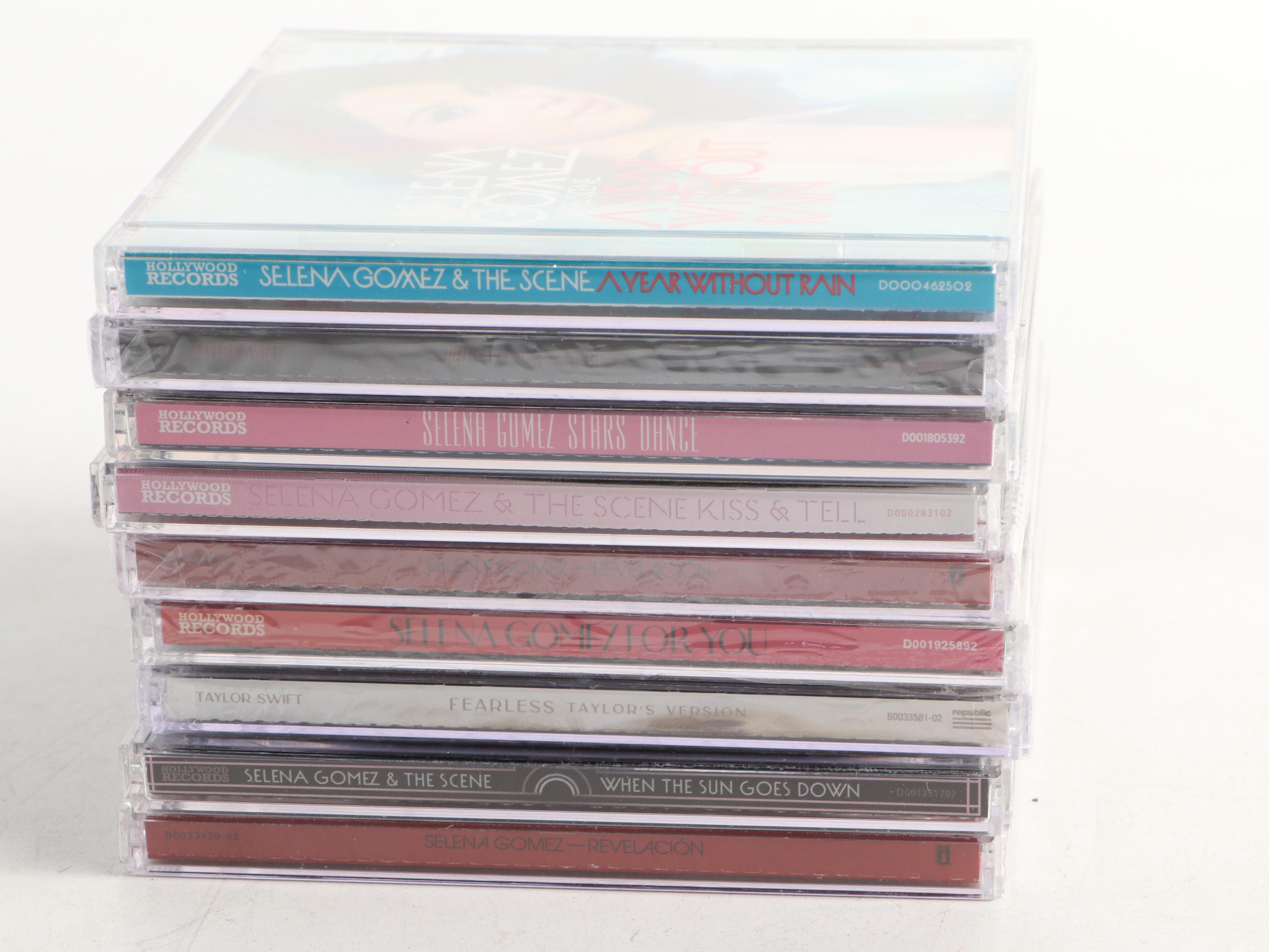 Selena Gomez and Taylor Swiift CDs, Framed Prints, Lyric Book, and More