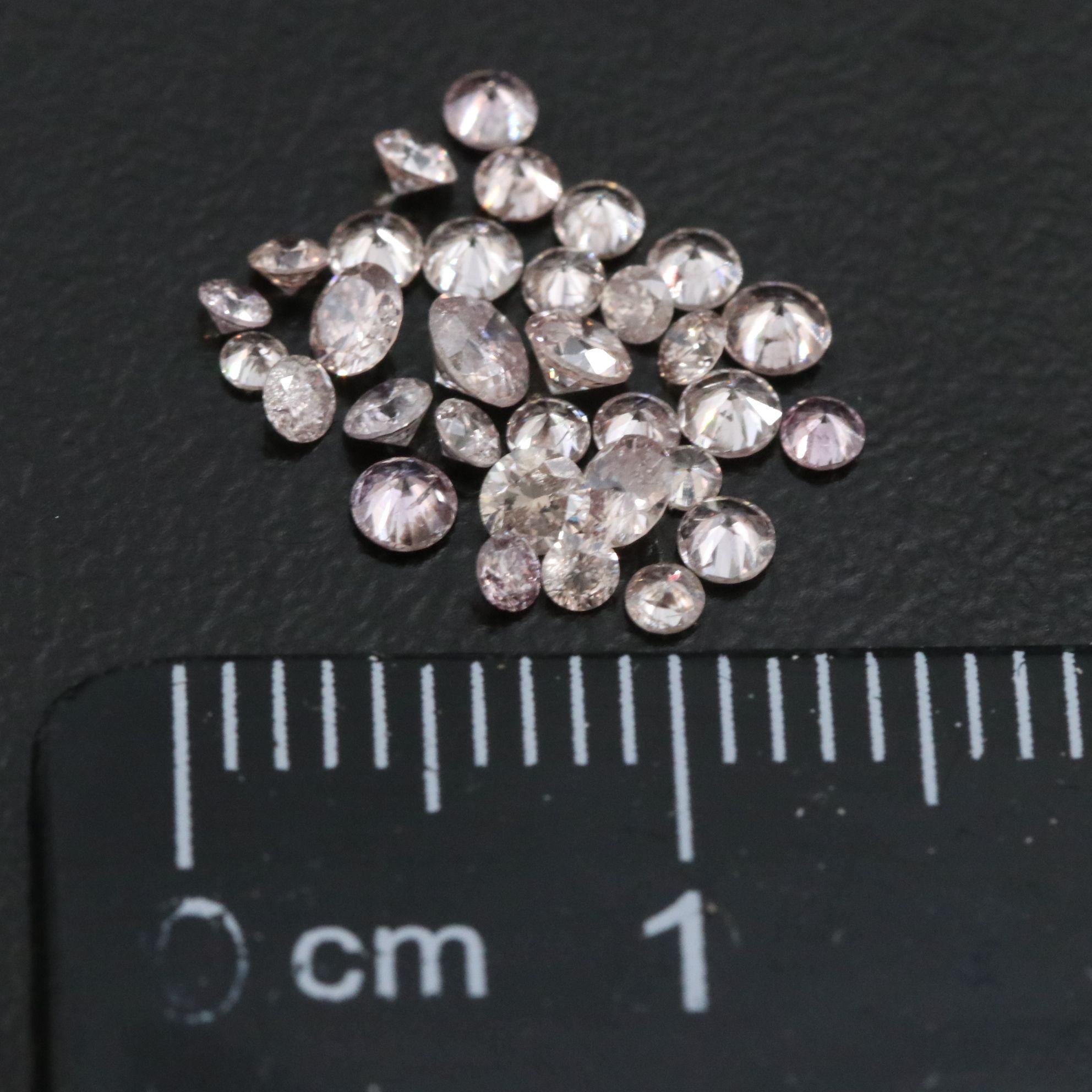 Loose 1.01 CTW Diamond Lot Featuring Fancy Pink Diamonds