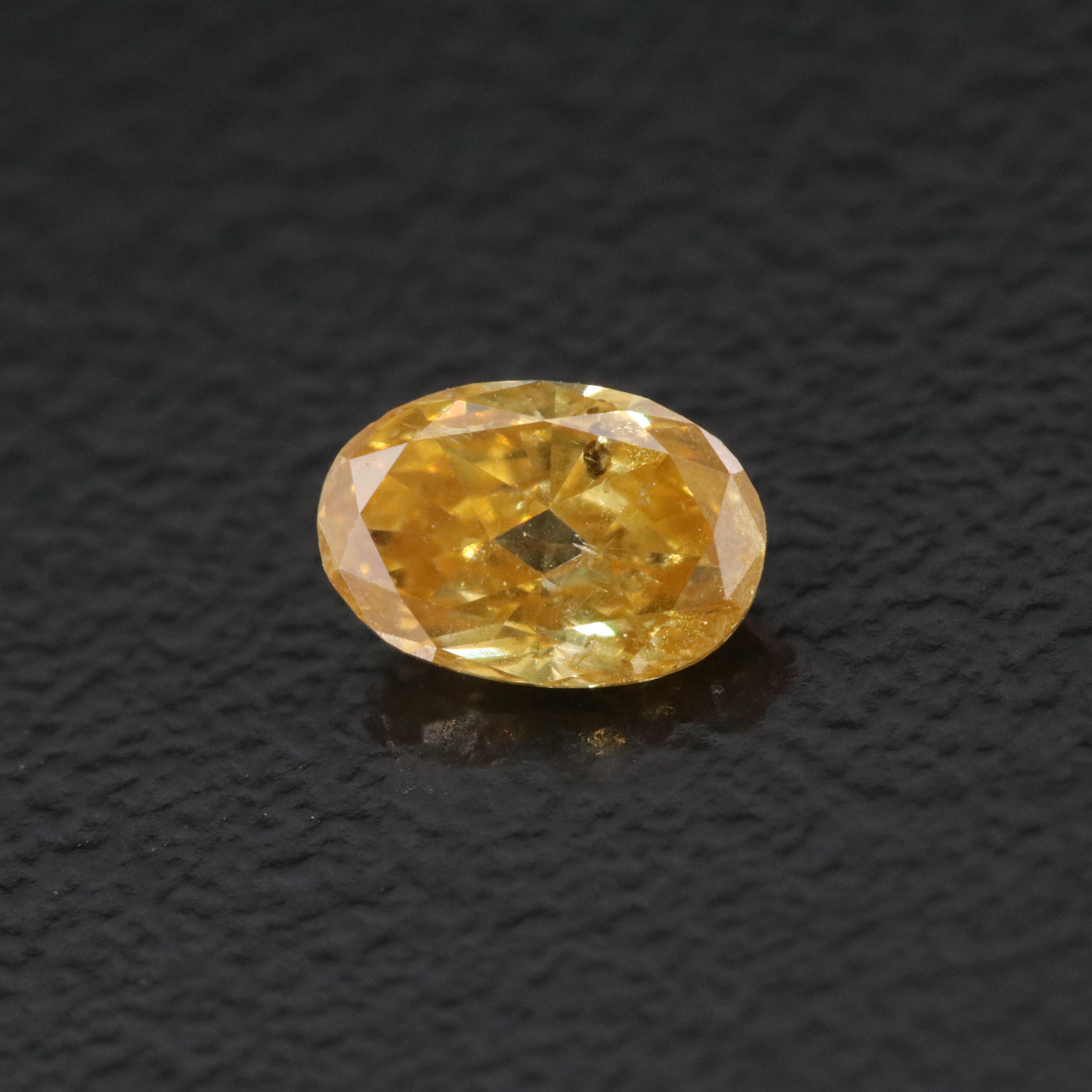 Loose 0.49 CT Fancy Yellow Diamond