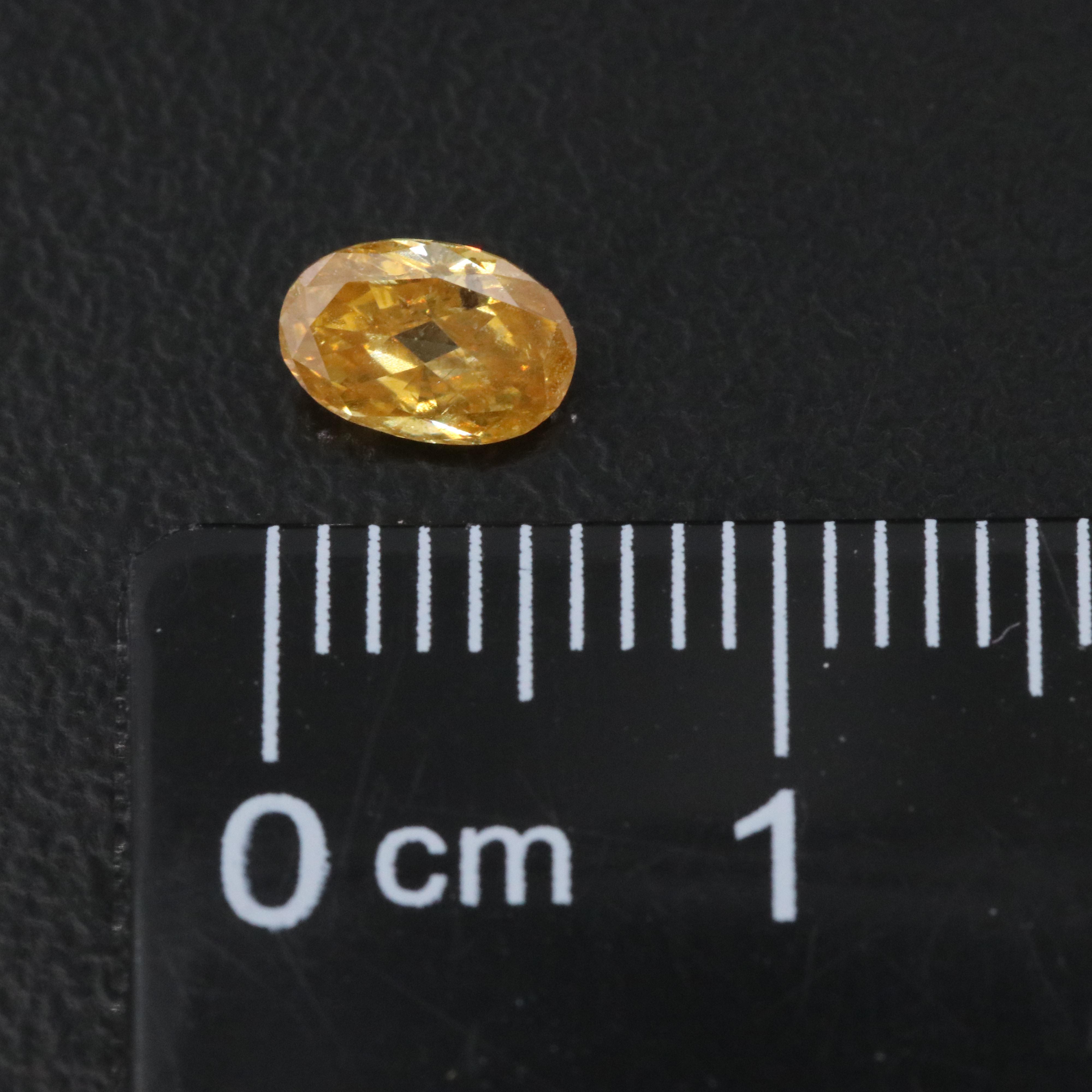 Loose 0.49 CT Fancy Yellow Diamond