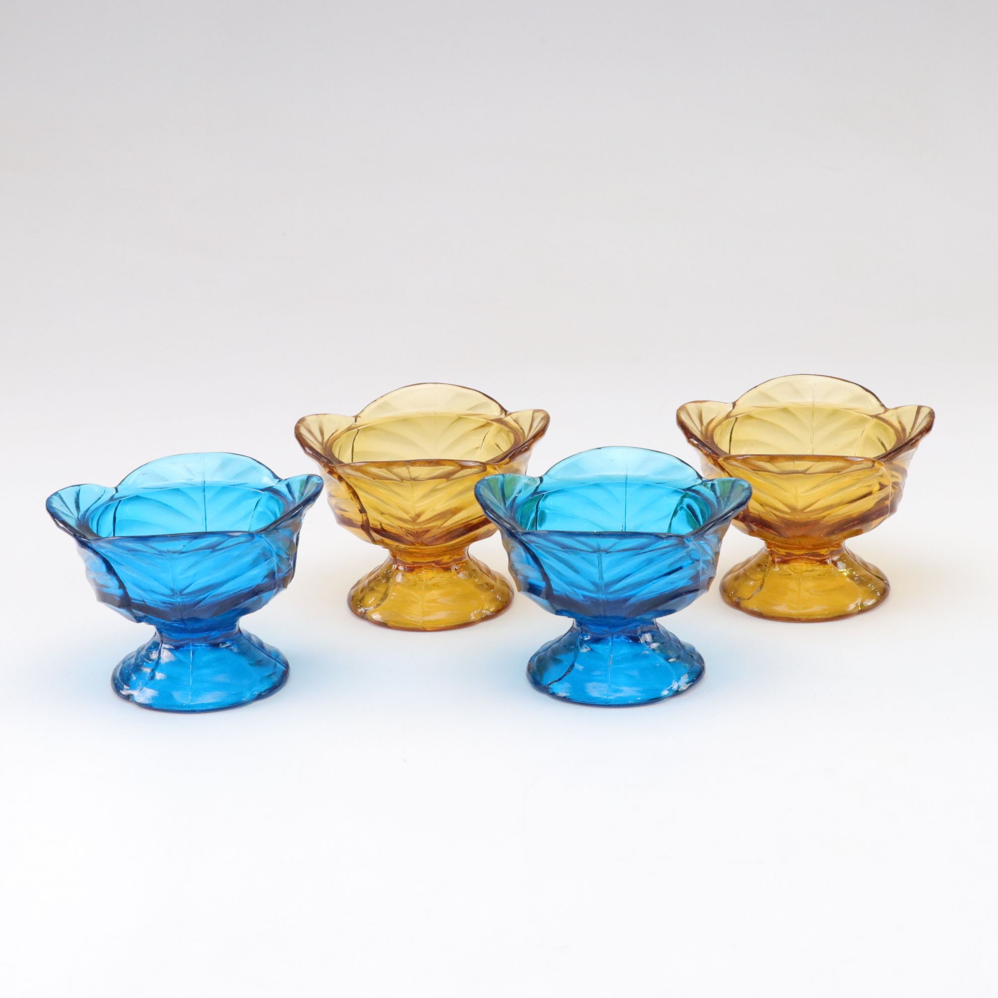 Eight Viking Glass "Cabbage Leaf" Footed Dessert Bowls, Late 20th Century
