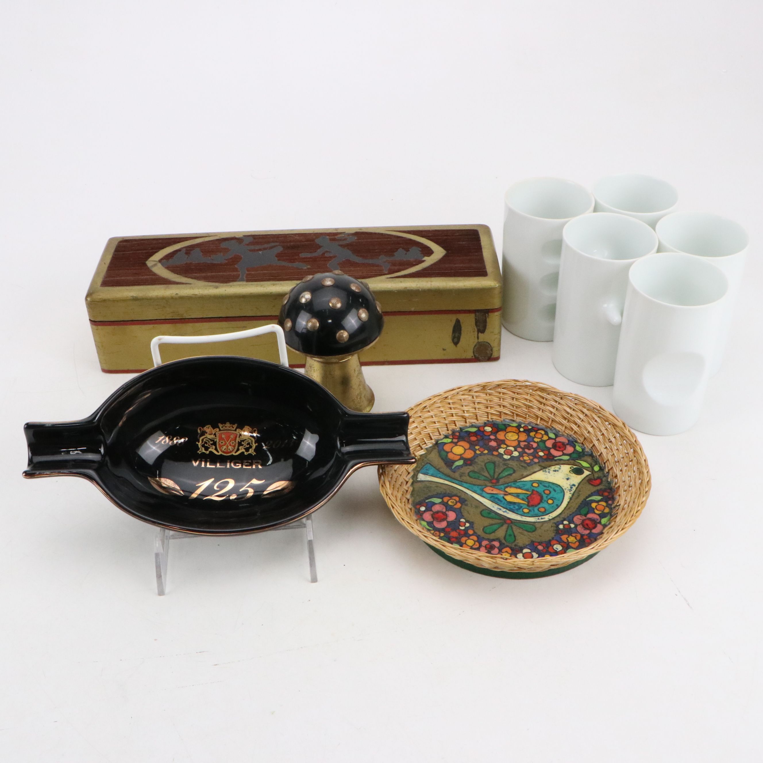 Carved Wood Cigarette Box, Japanese Modernist Mugs, and More Décor