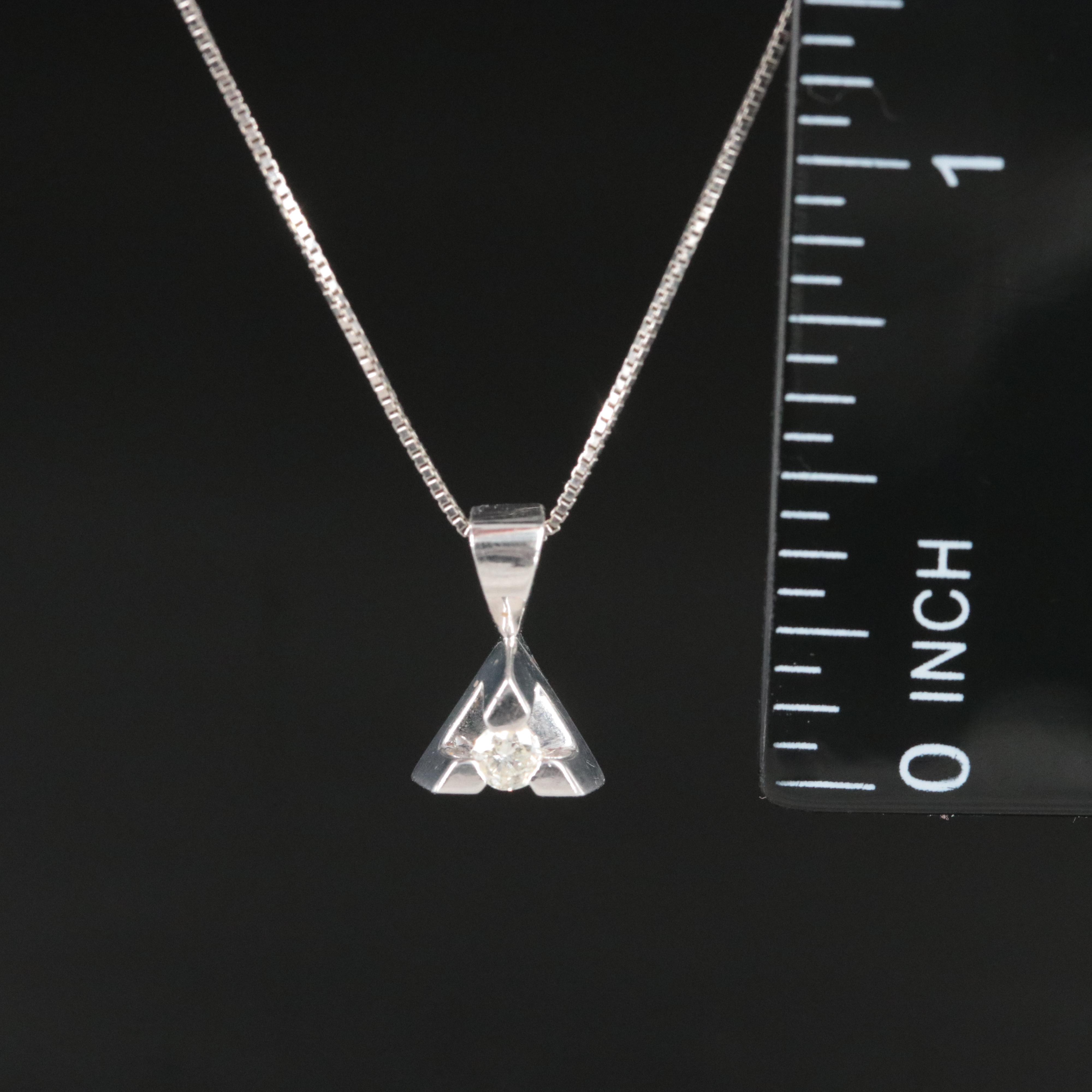 14K 0.07 CT Diamond Pendant on 10K Chain