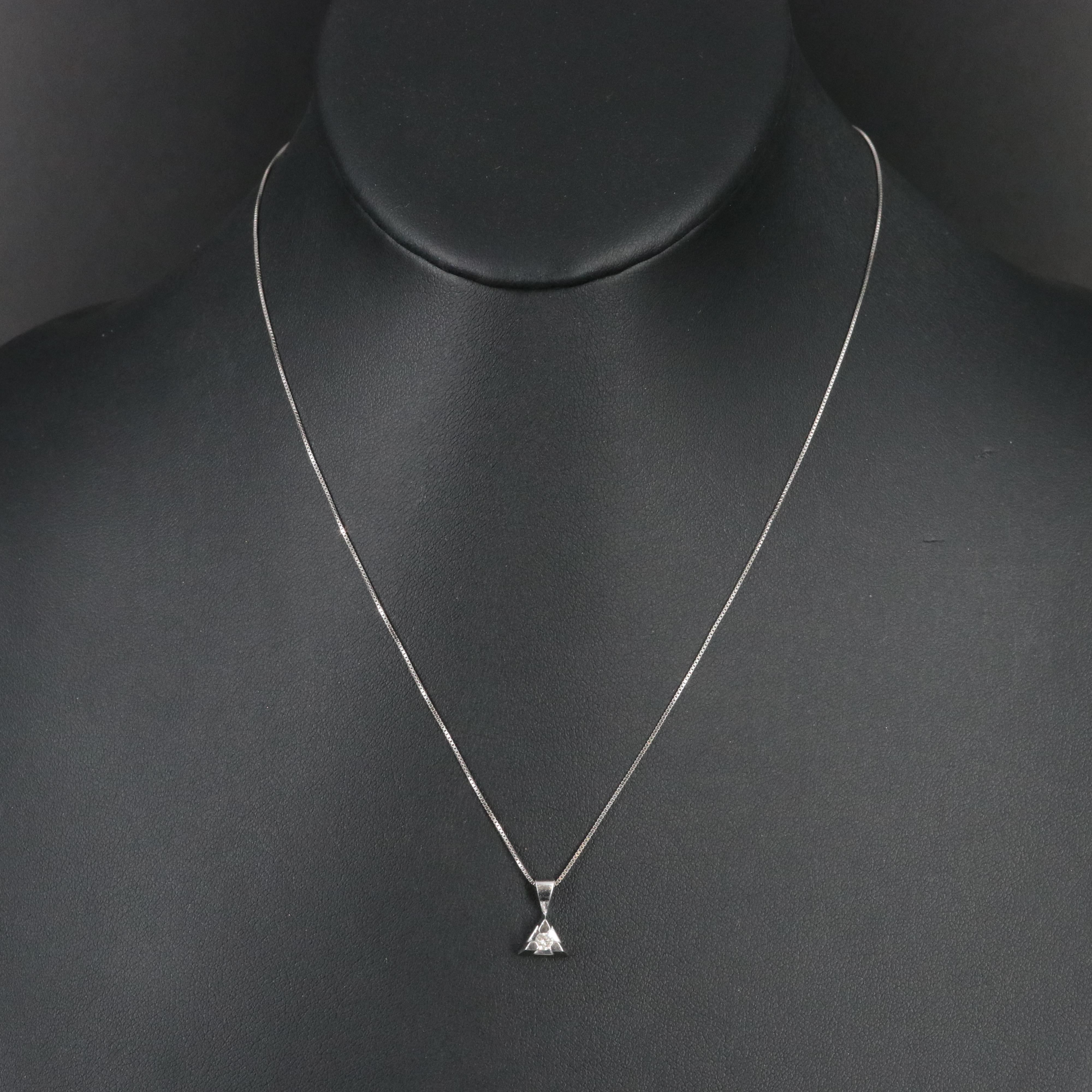 14K 0.07 CT Diamond Pendant on 10K Chain