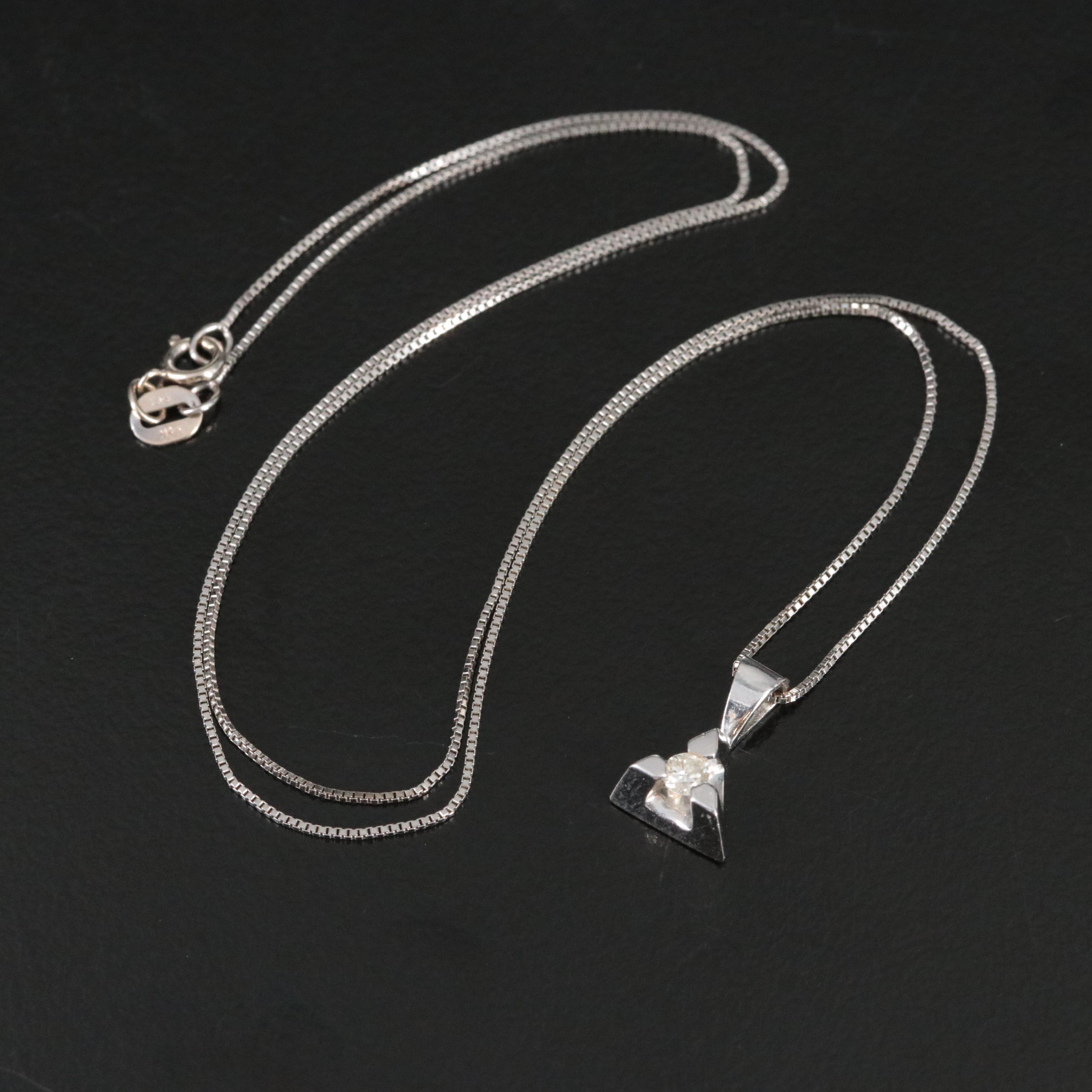 14K 0.07 CT Diamond Pendant on 10K Chain