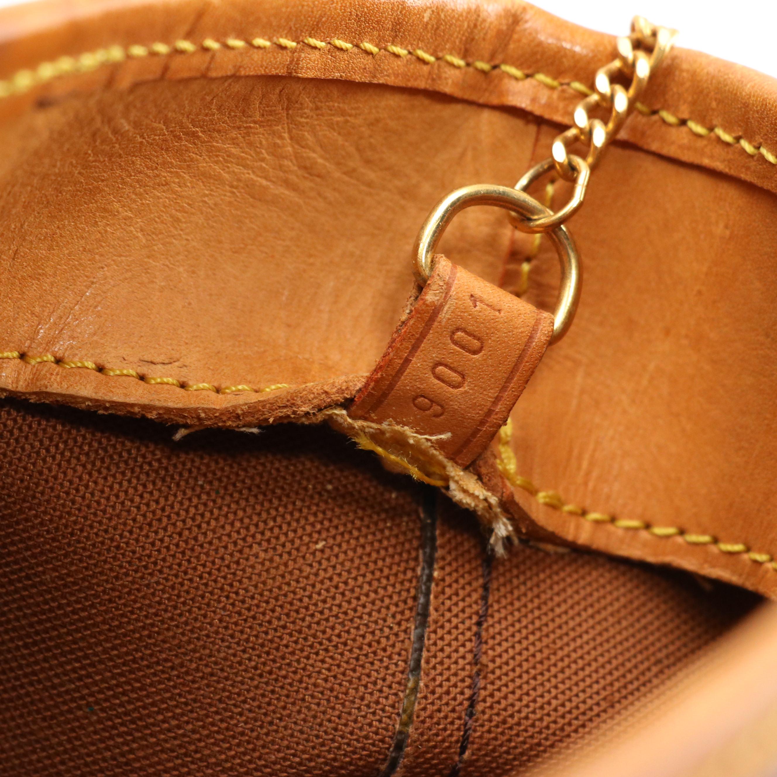 Louis Vuitton Petite Bucket Bag in Monogram Canvas and Vachetta Leather