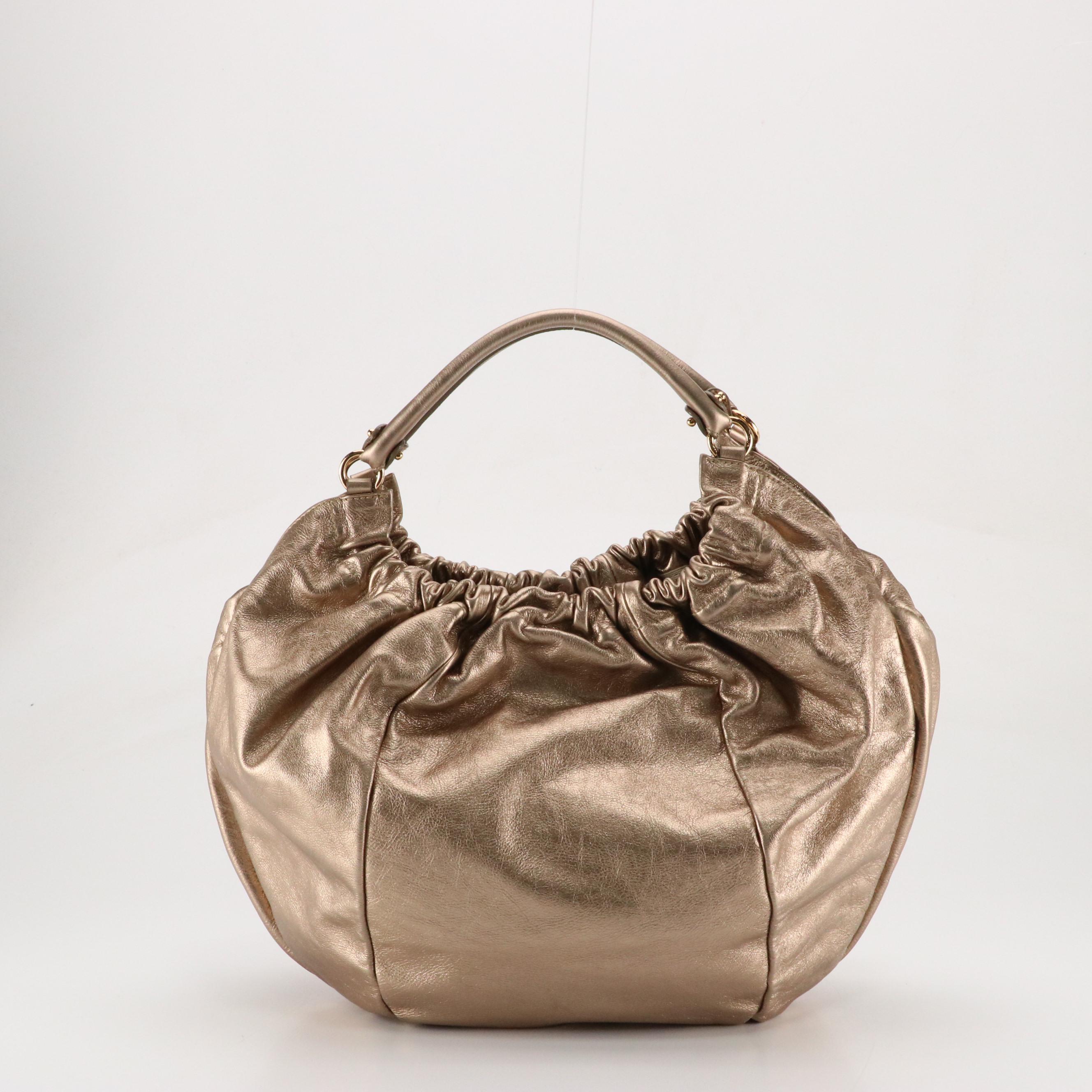 Salvatore Ferragamo Vara Bow Double Pocket Satchel in Metallic Gold Leather