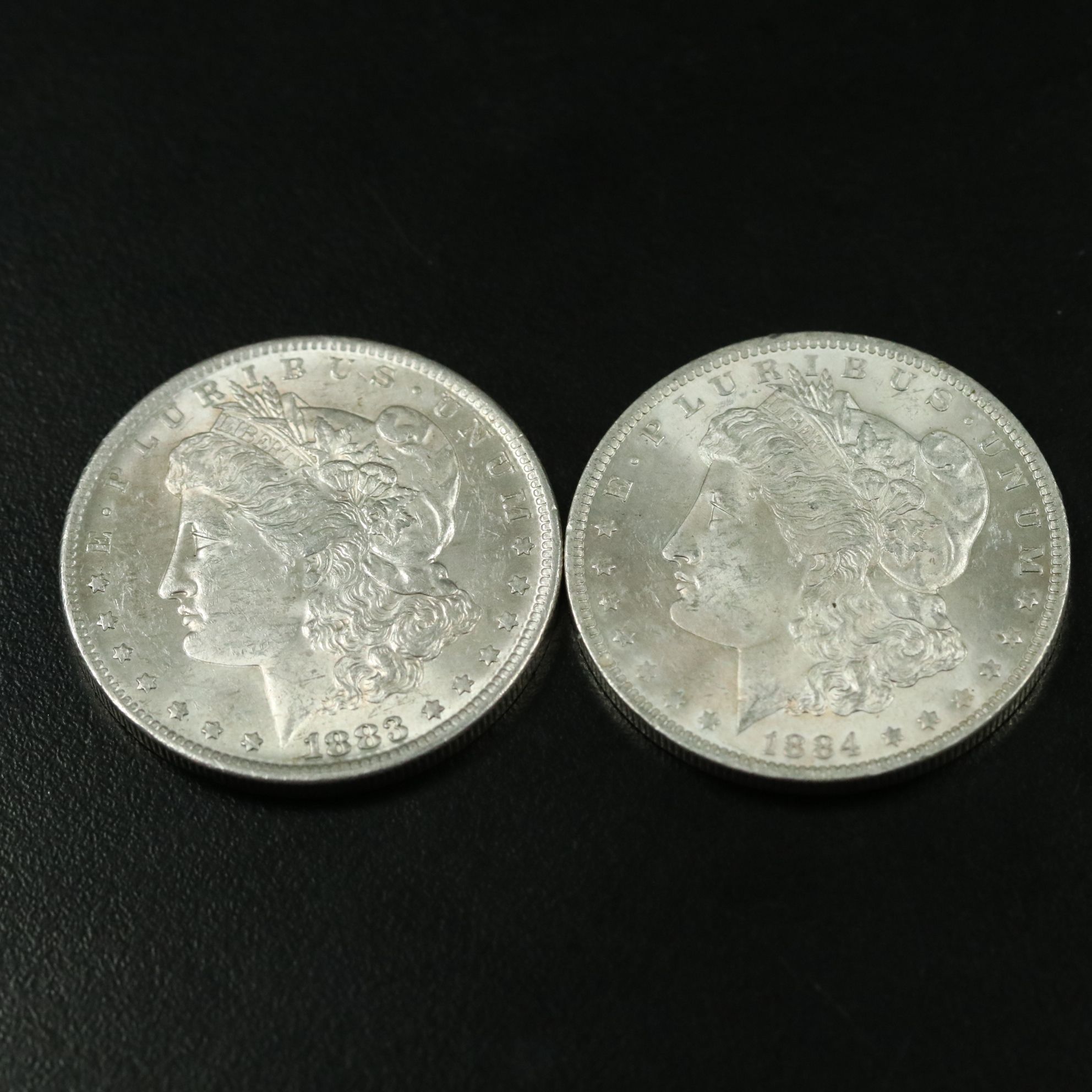 1883-O and 1984-O Morgan Silver Dollars