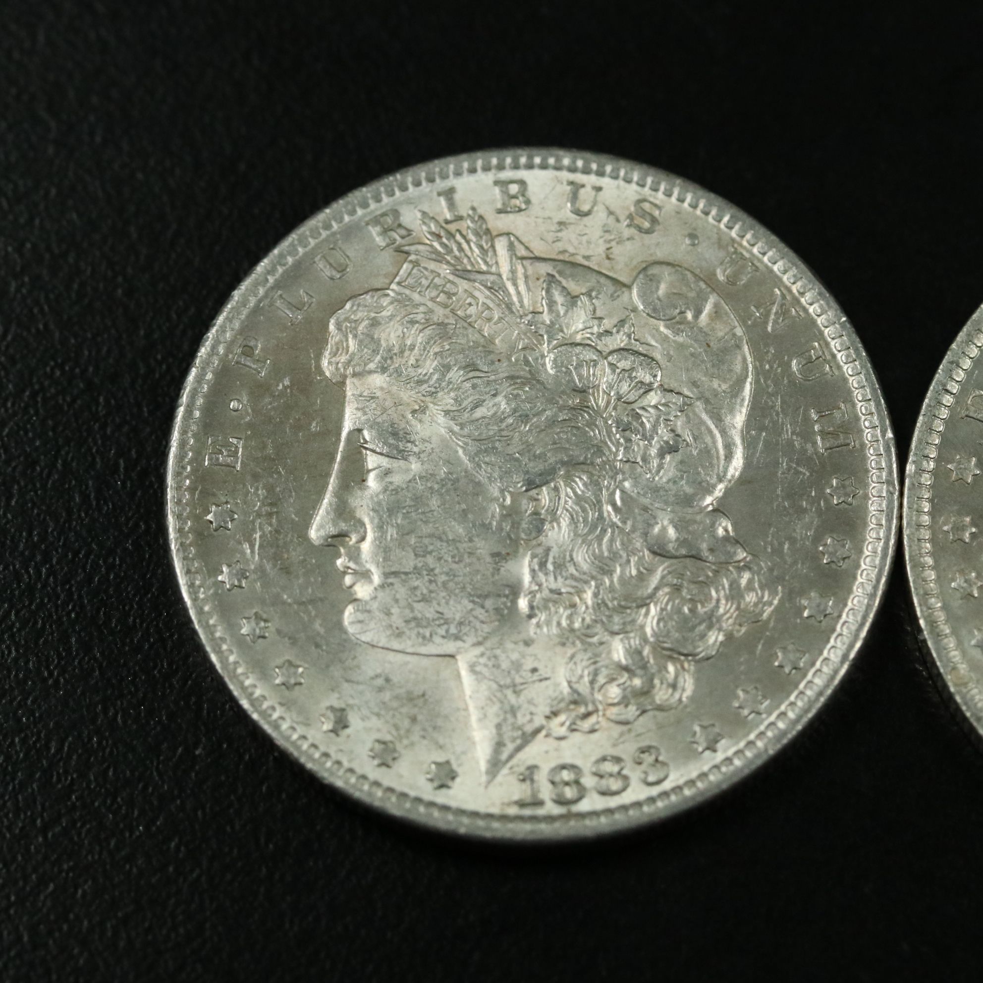 1883-O and 1984-O Morgan Silver Dollars