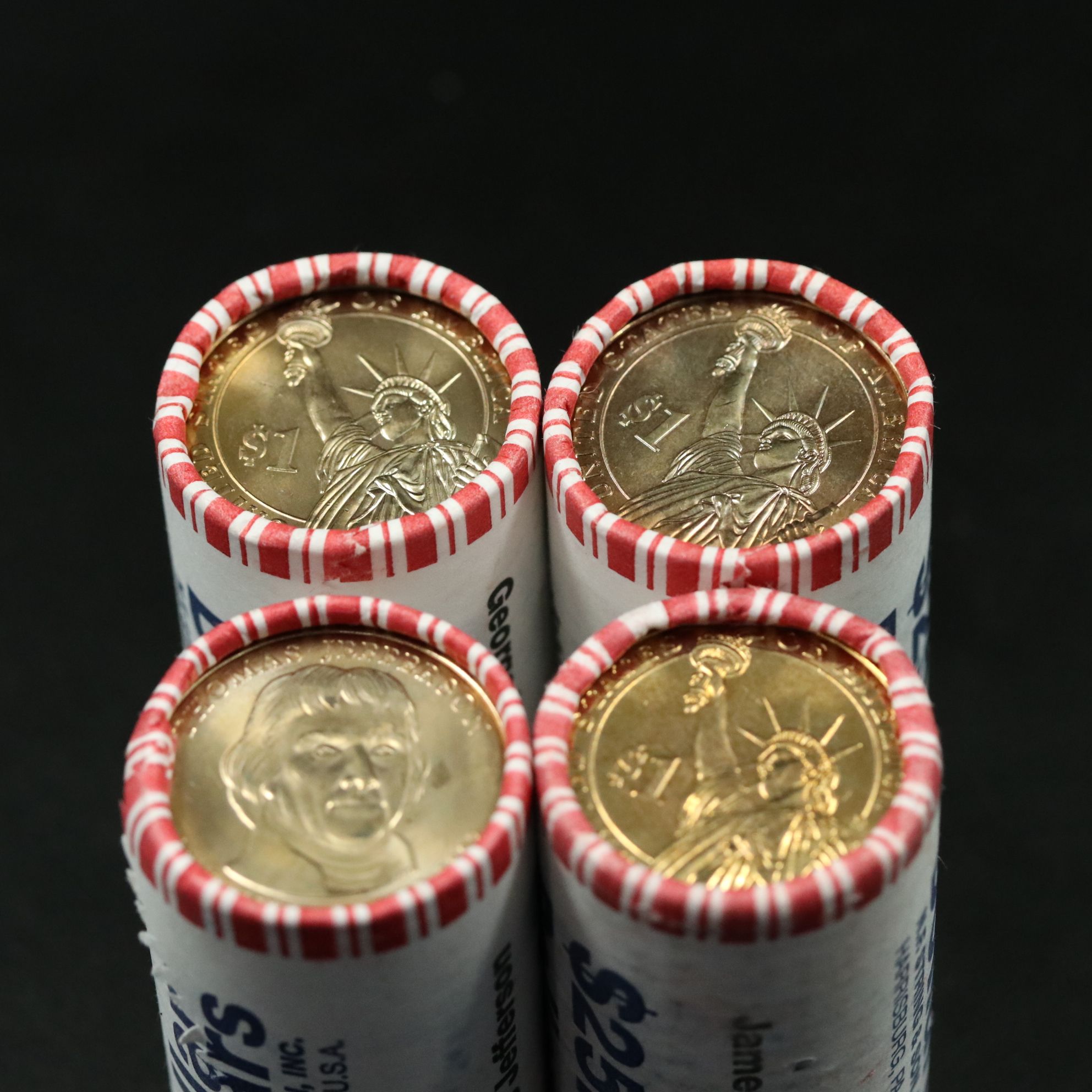 Four Different Mint Rolls of 25 Presidential Dollars