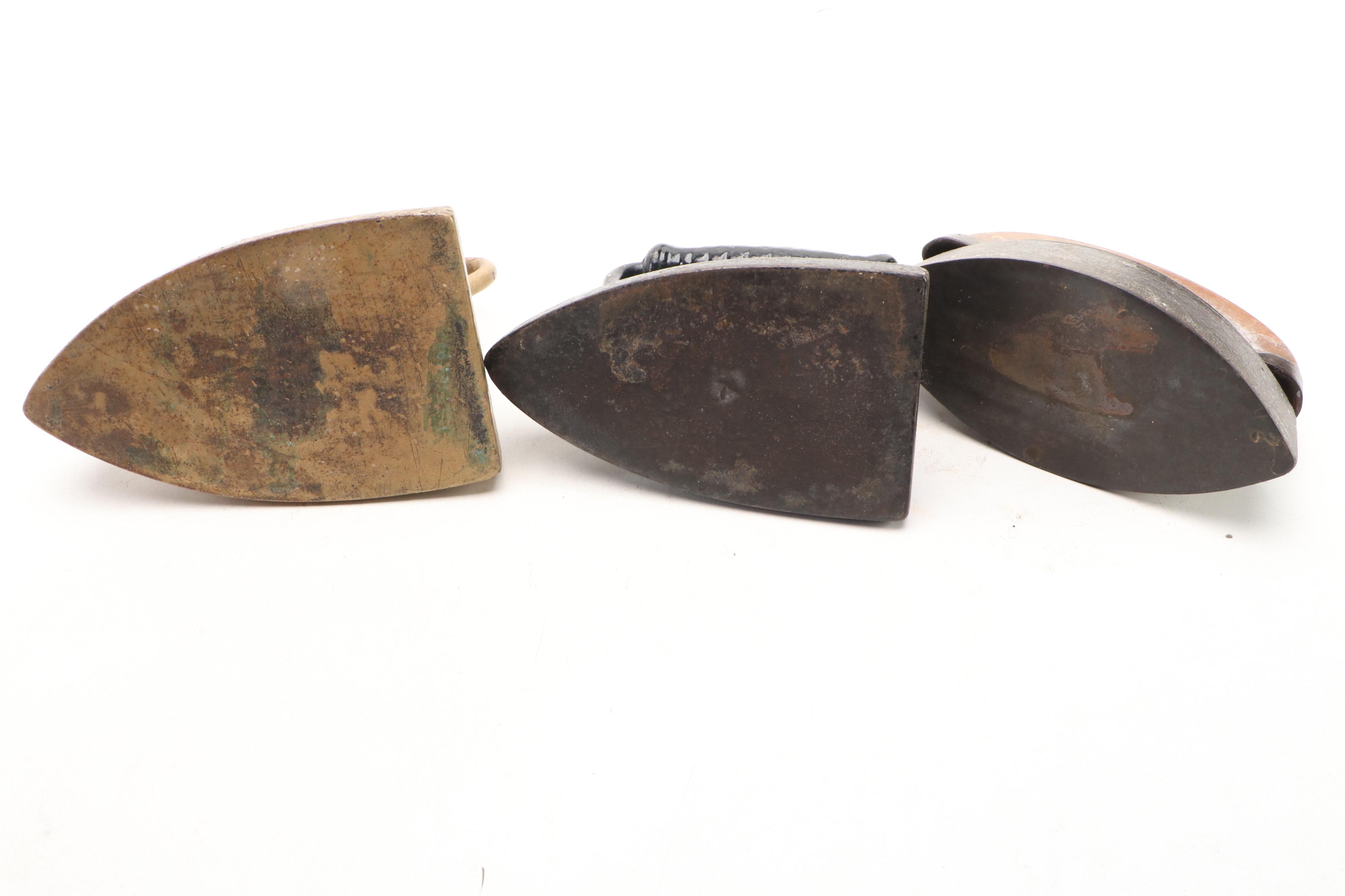 Antique Sad Irons with Wood and Twisted Metal Handles