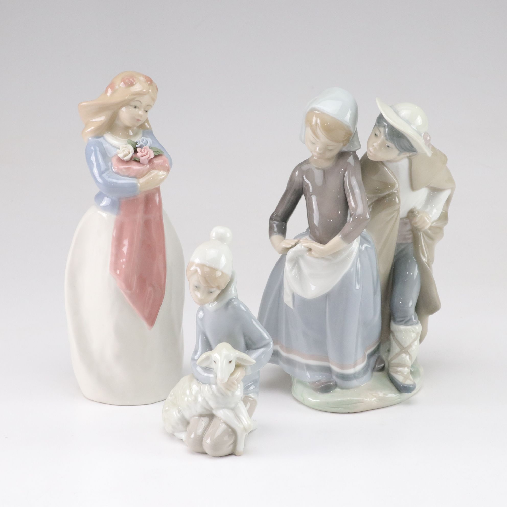 Lladró "Little Couple Kissing" and "Boy with Lamb" with Tengra Figure, 1990s