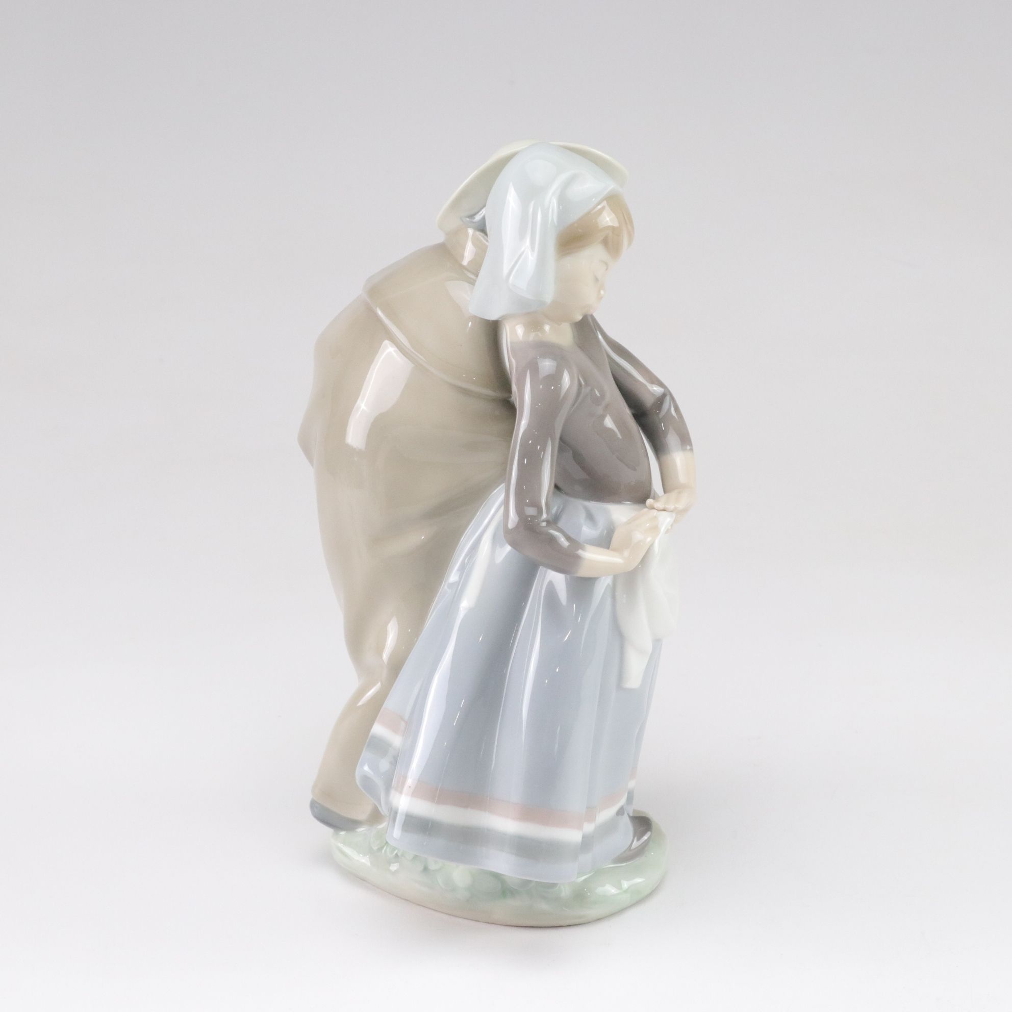 Lladró "Little Couple Kissing" and "Boy with Lamb" with Tengra Figure, 1990s