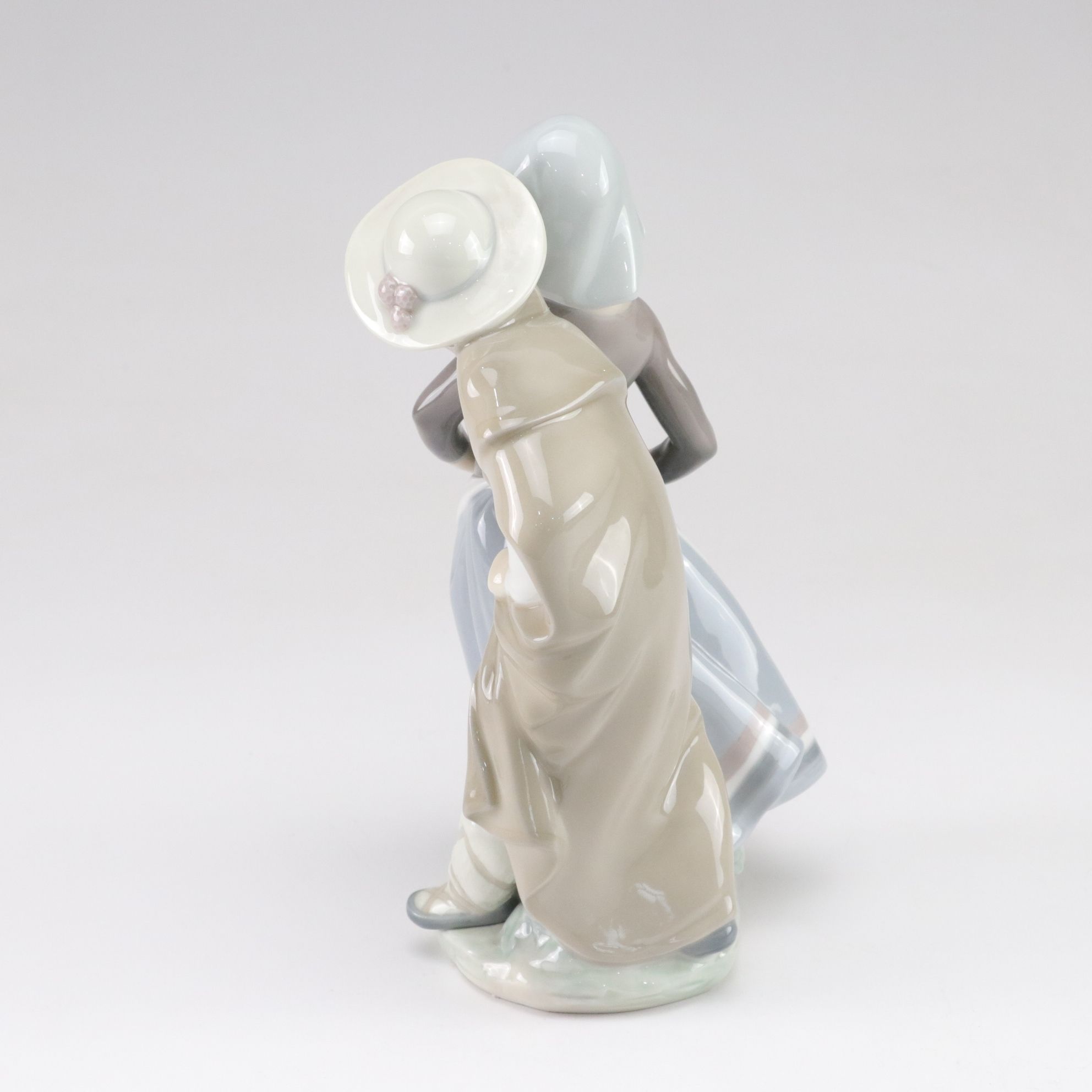 Lladró "Little Couple Kissing" and "Boy with Lamb" with Tengra Figure, 1990s