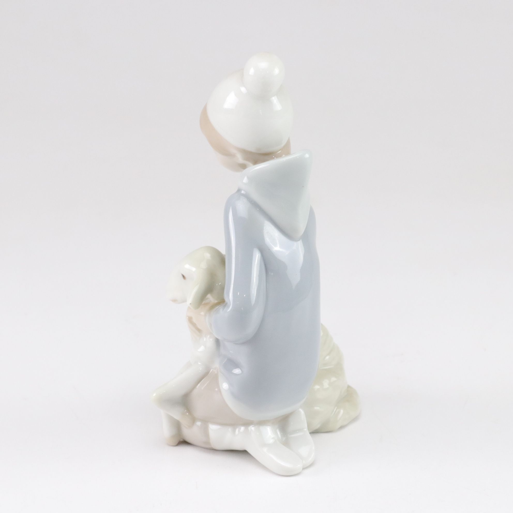 Lladró "Little Couple Kissing" and "Boy with Lamb" with Tengra Figure, 1990s