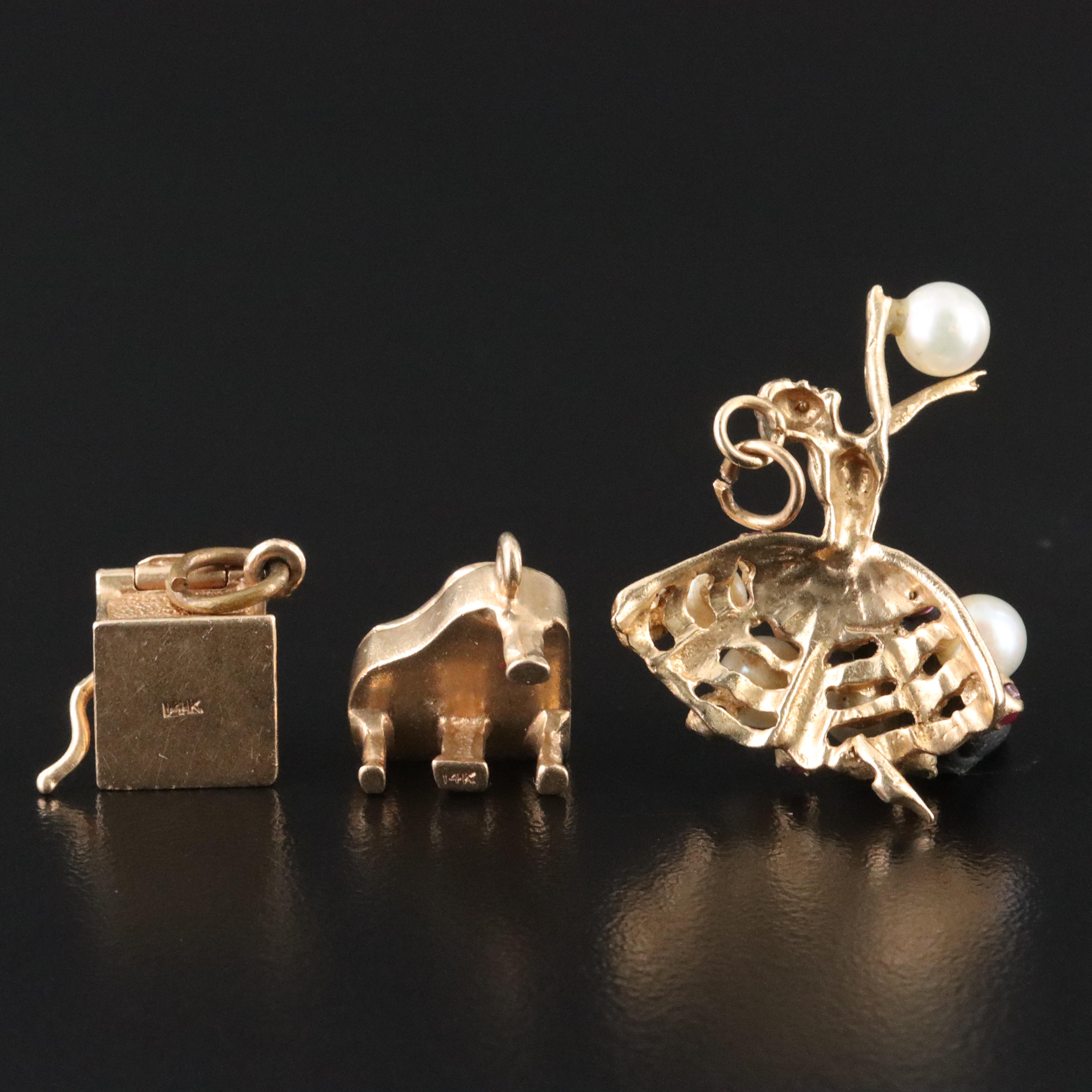 14K Charm Collection Featuring Pearls, Rubies, Sapphires and Articulation