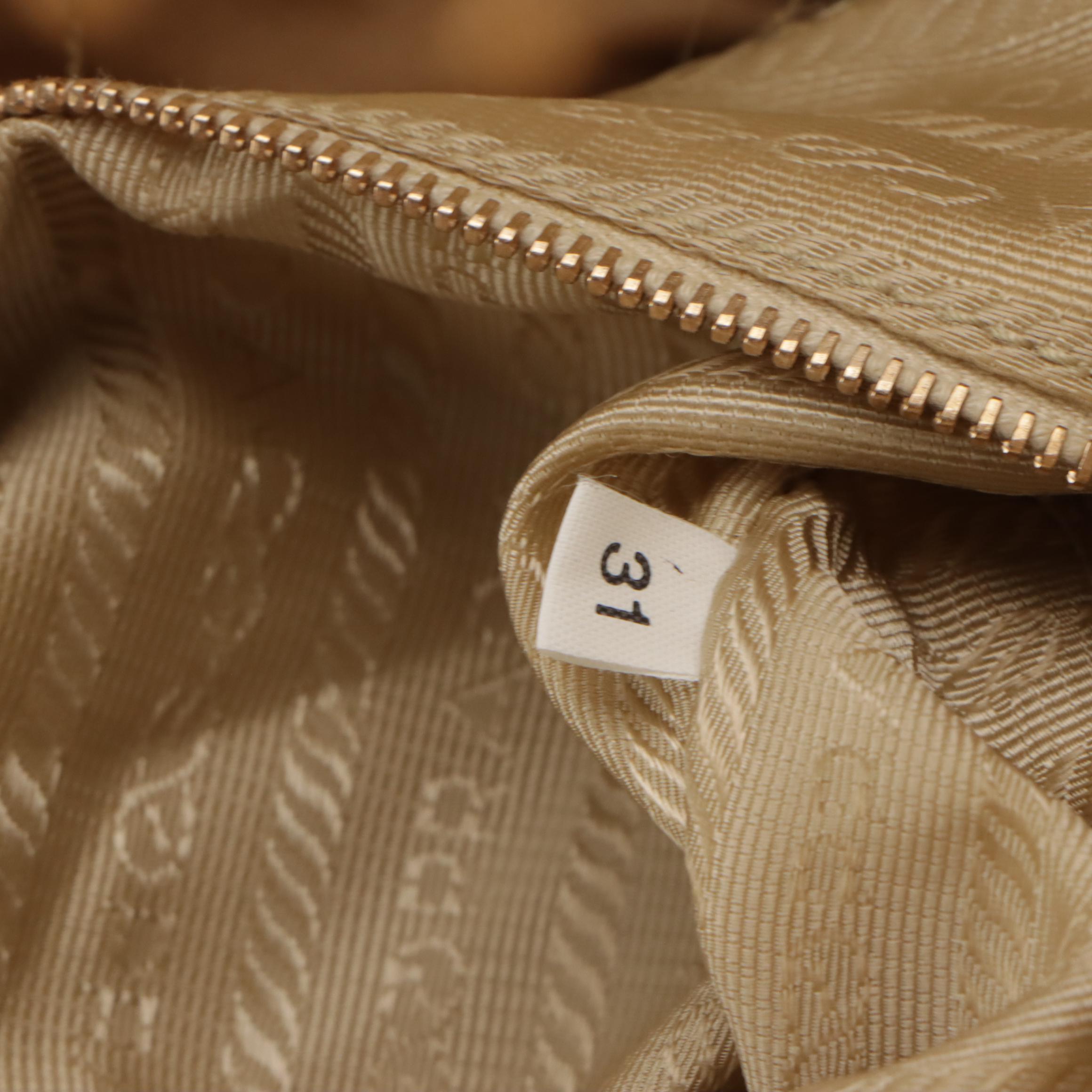 Prada Grommet Embellished Nappa Leather Zip-Top Handbag with Keys and Padlock