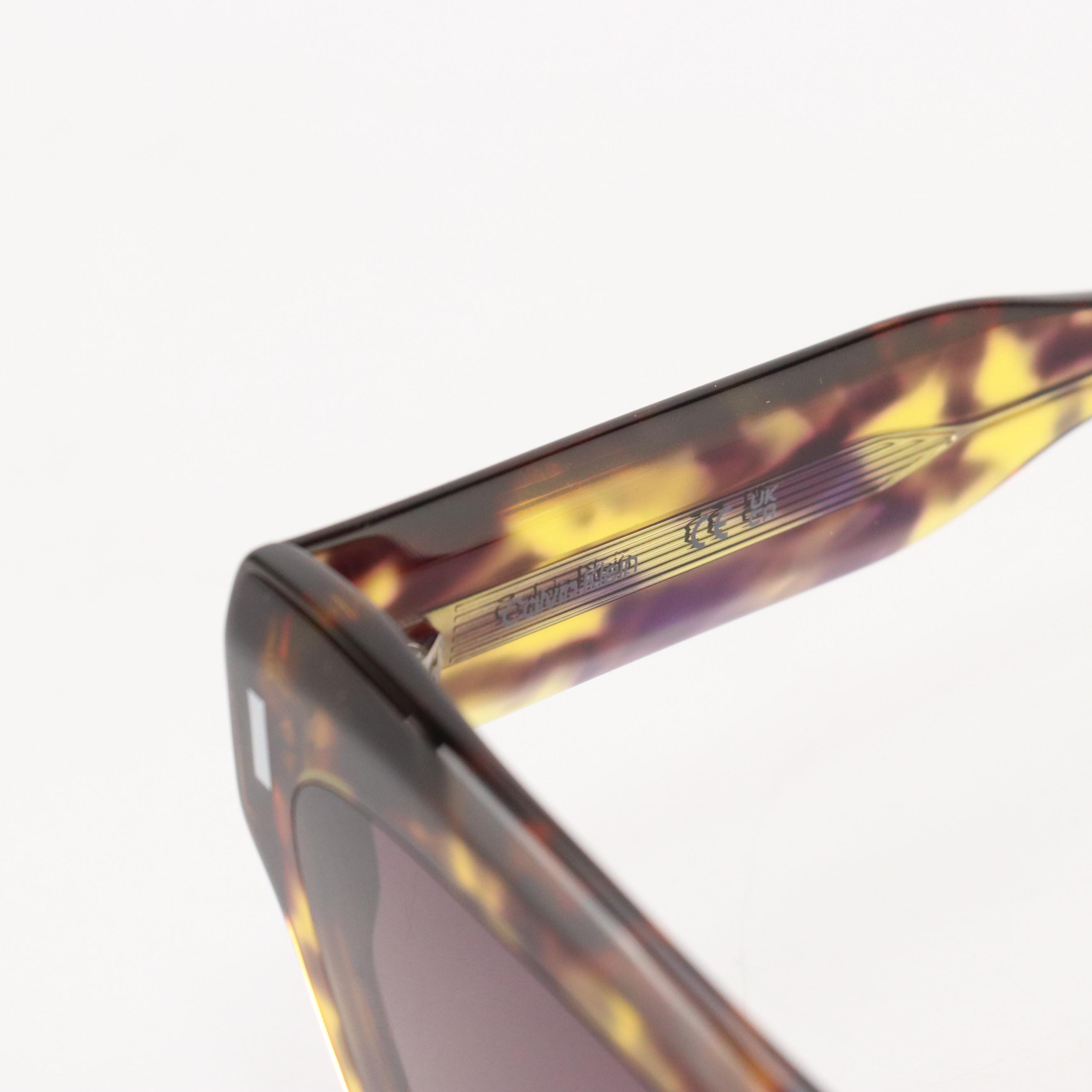 Calvin Klein CK23503S Purple Havana Butterfly Sunglasses with Case