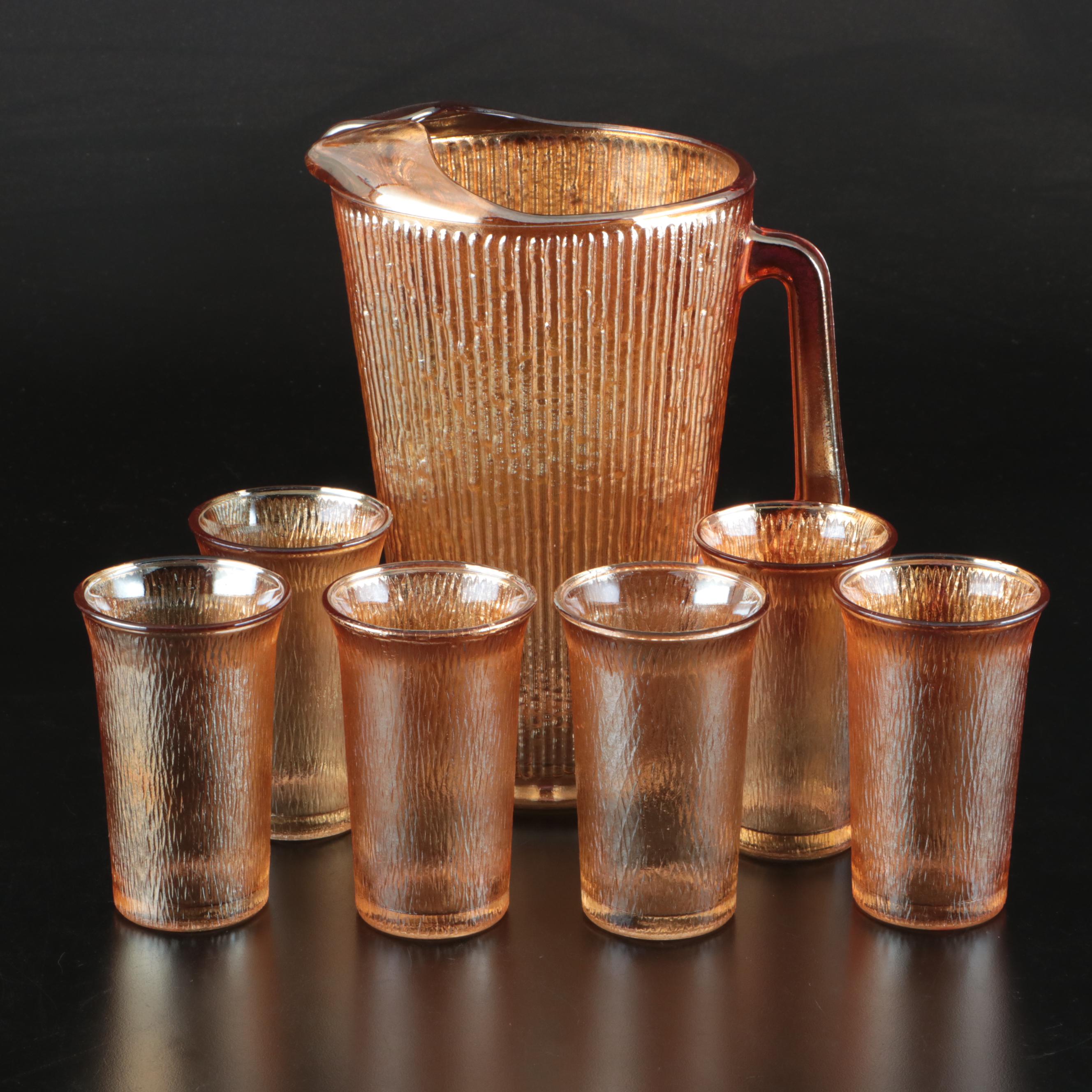 Jeannette "Tree Bark" Marigold Carnival Glass Pitcher and Tumblers, Mid-20th C.