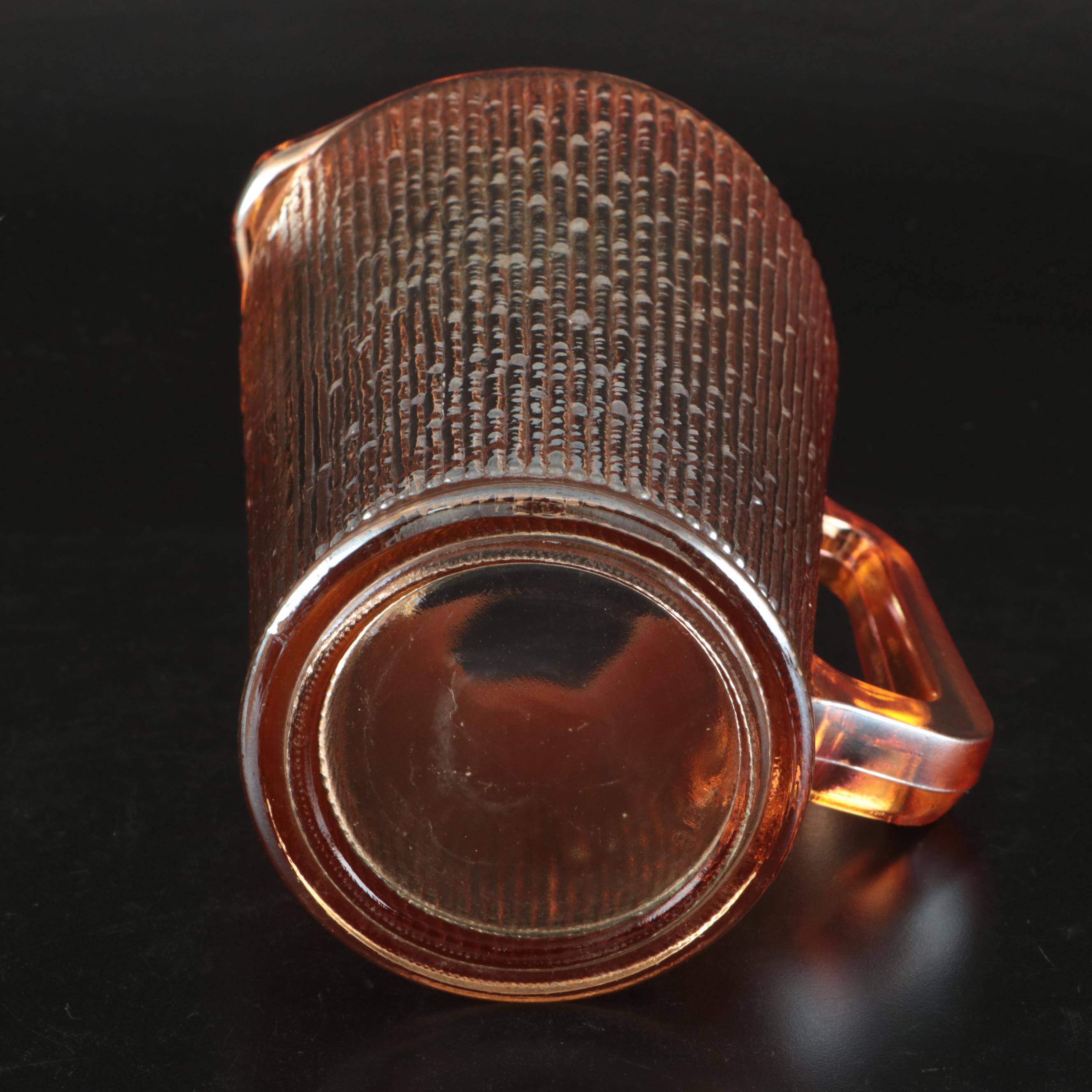 Jeannette "Tree Bark" Marigold Carnival Glass Pitcher and Tumblers, Mid-20th C.
