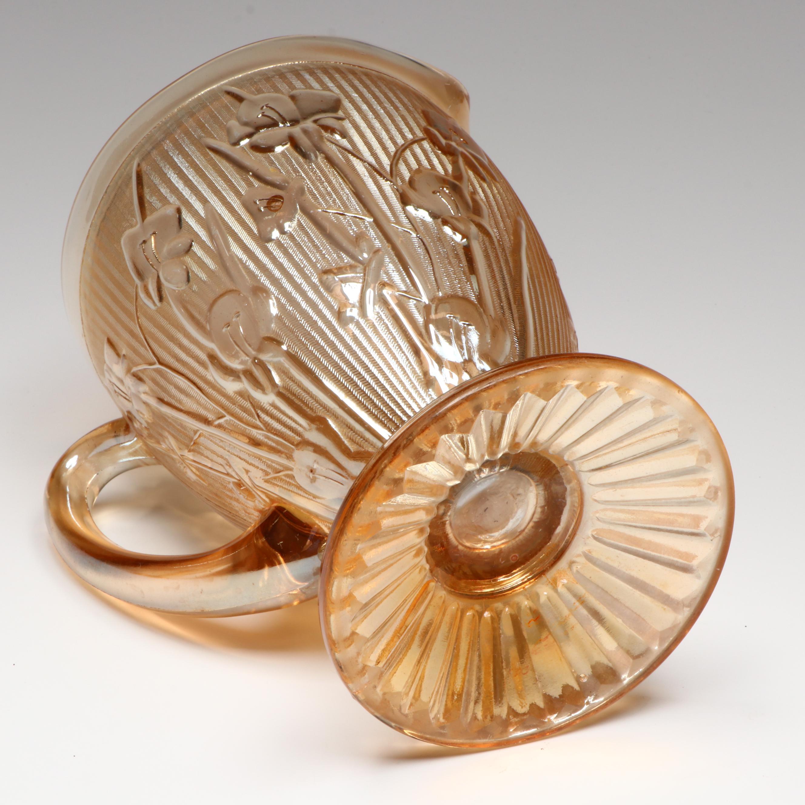 Jeannette "Iris" Carnival Glass Pitcher and Footed Tumblers, Mid to Late 20th C.