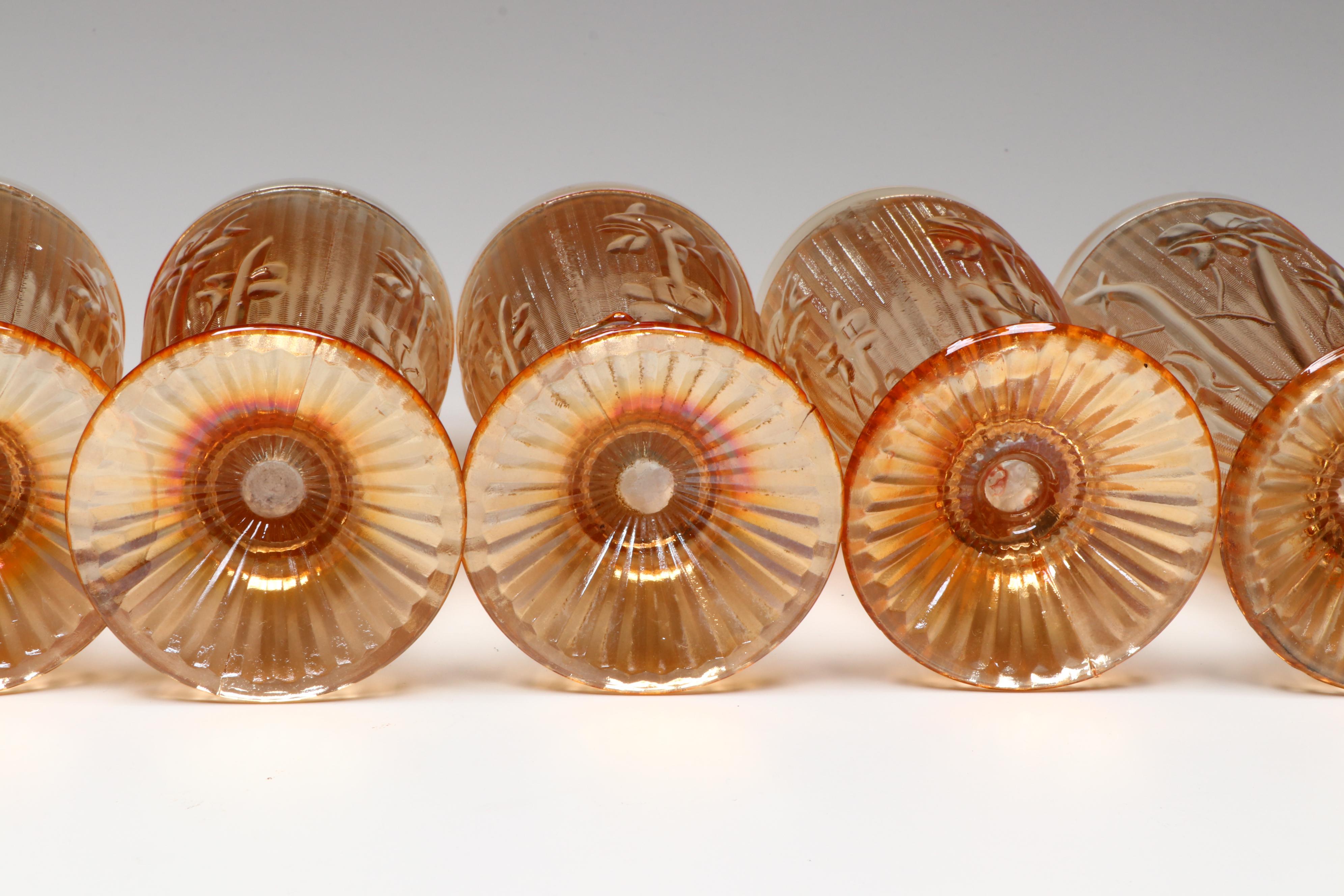 Jeannette "Iris" Carnival Glass Pitcher and Footed Tumblers, Mid to Late 20th C.