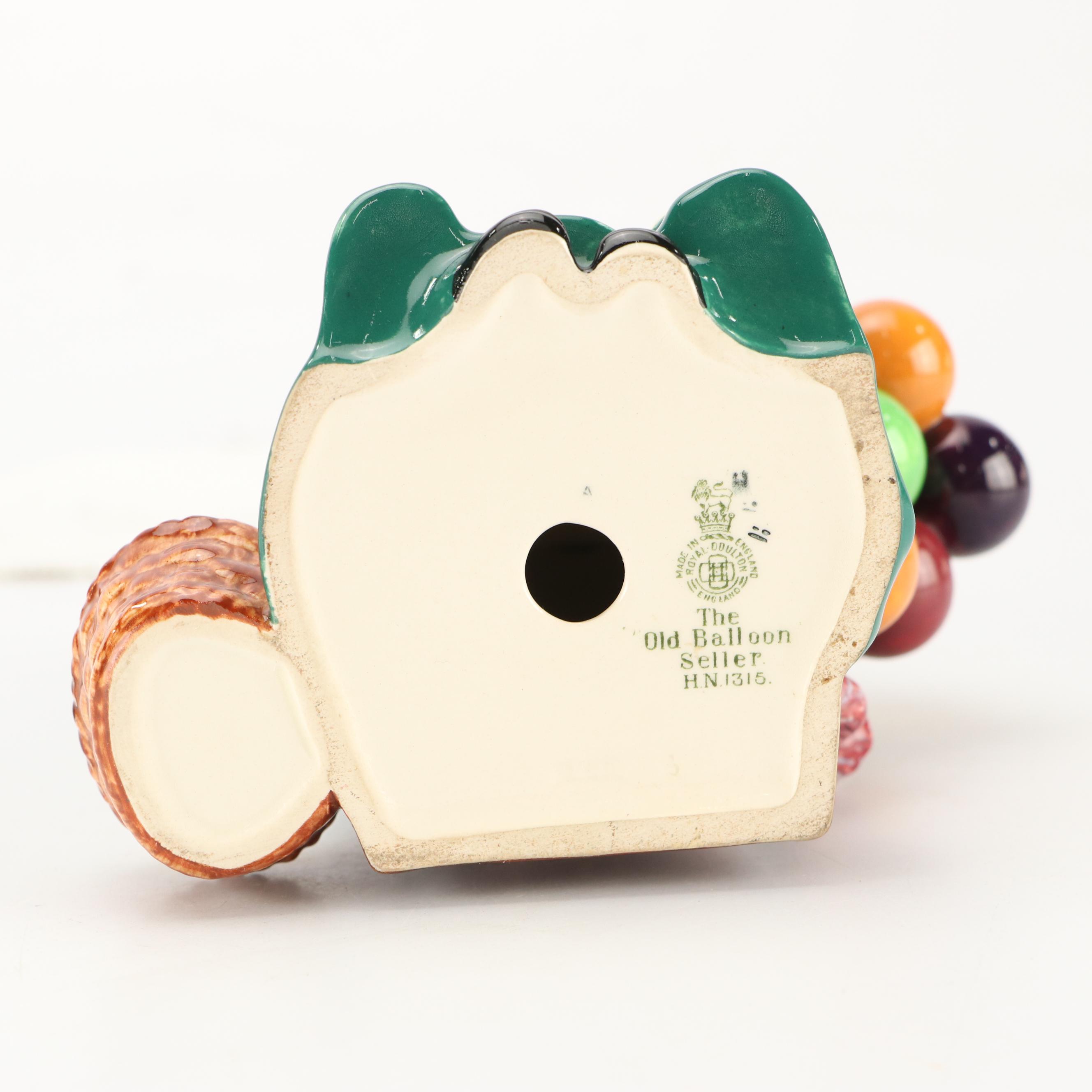 Royal Doulton "The Old Balloon Seller" with Shakespeare Plate and Sconce Shelves