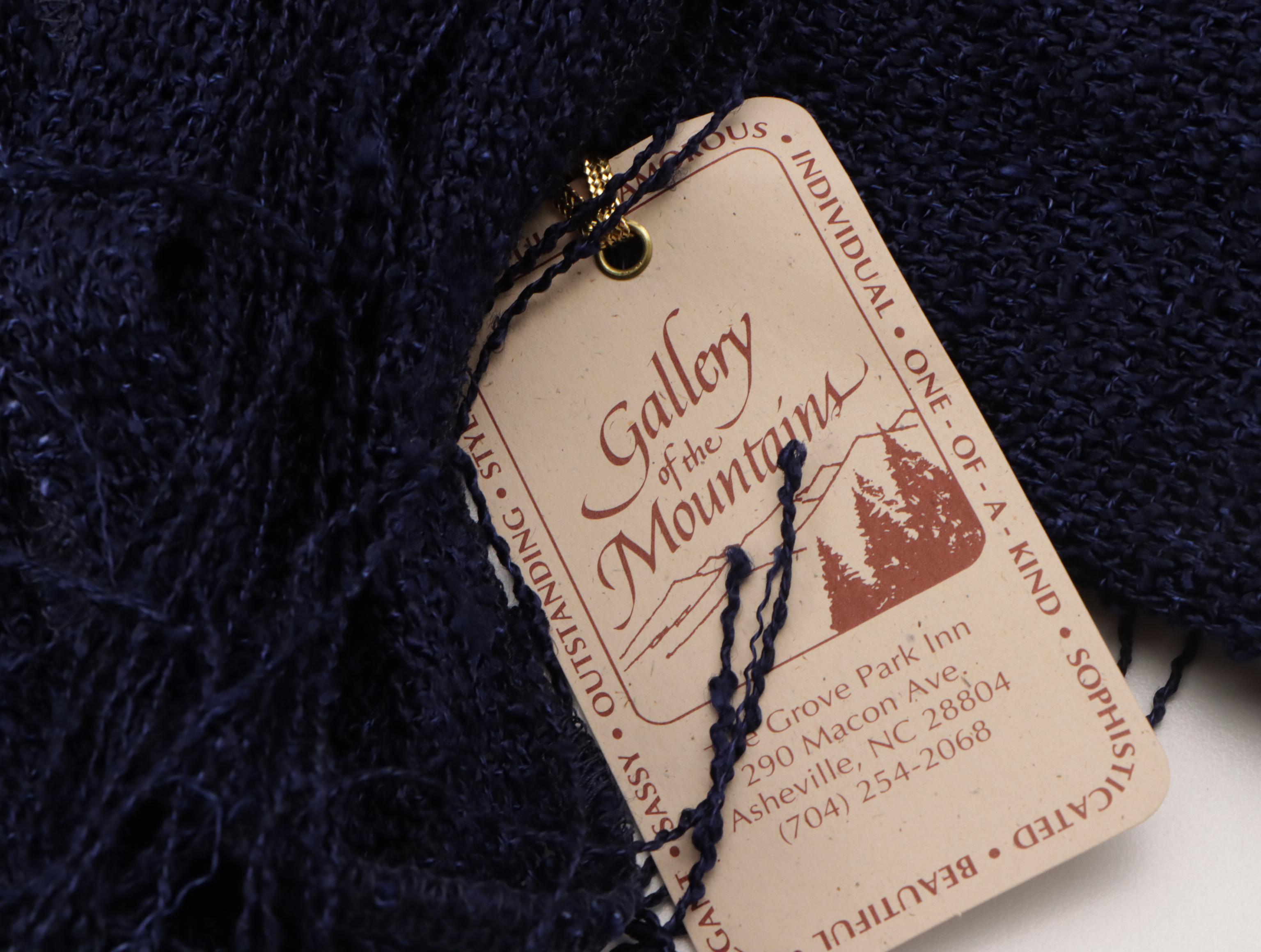 Assorted Scarves and Wraps Featuring Polo Ralph Lauren, Leonardo, and More