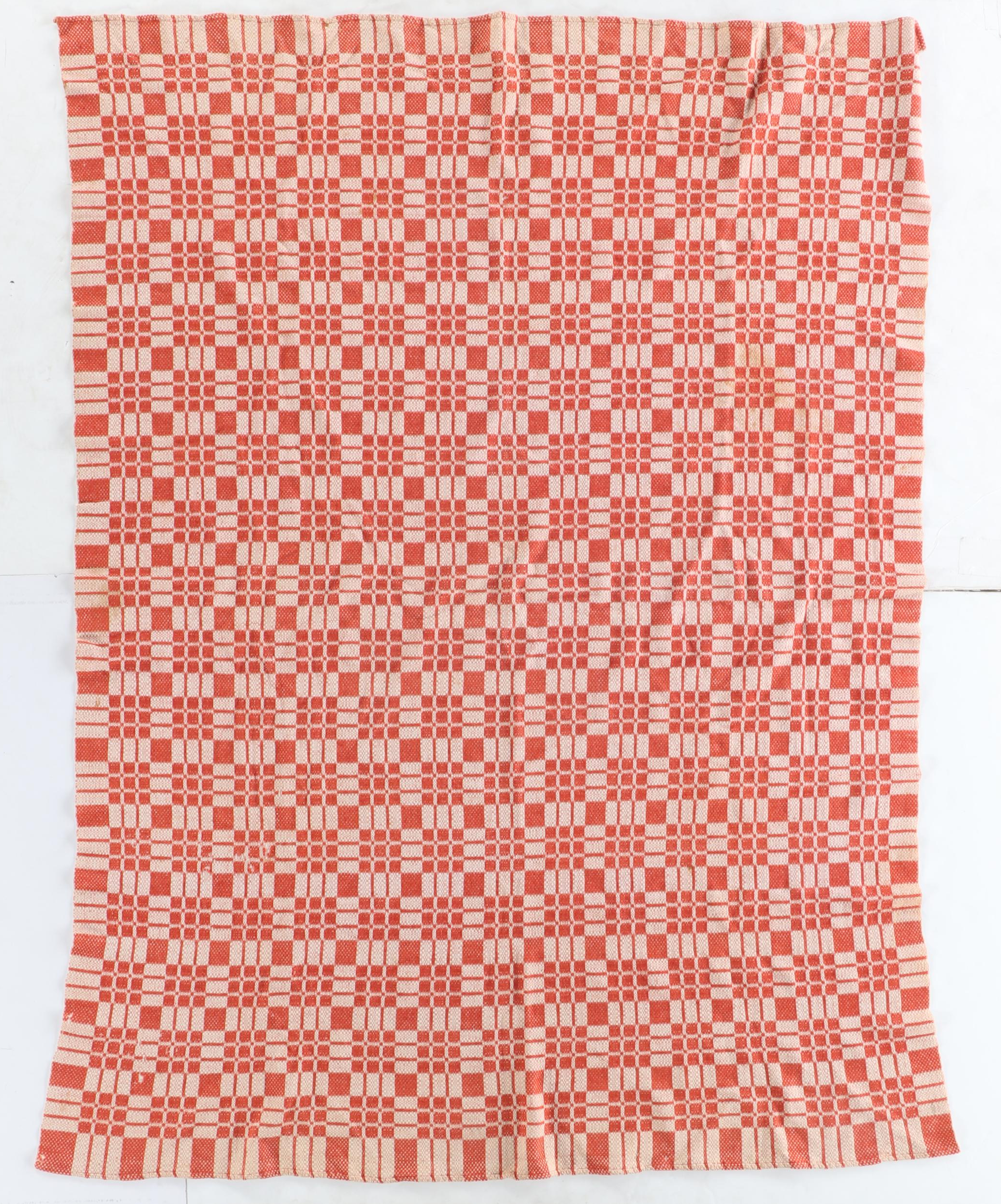 American Colonial Style Oak Quilt Rack with Red and White Woven Coverlet, 20th C