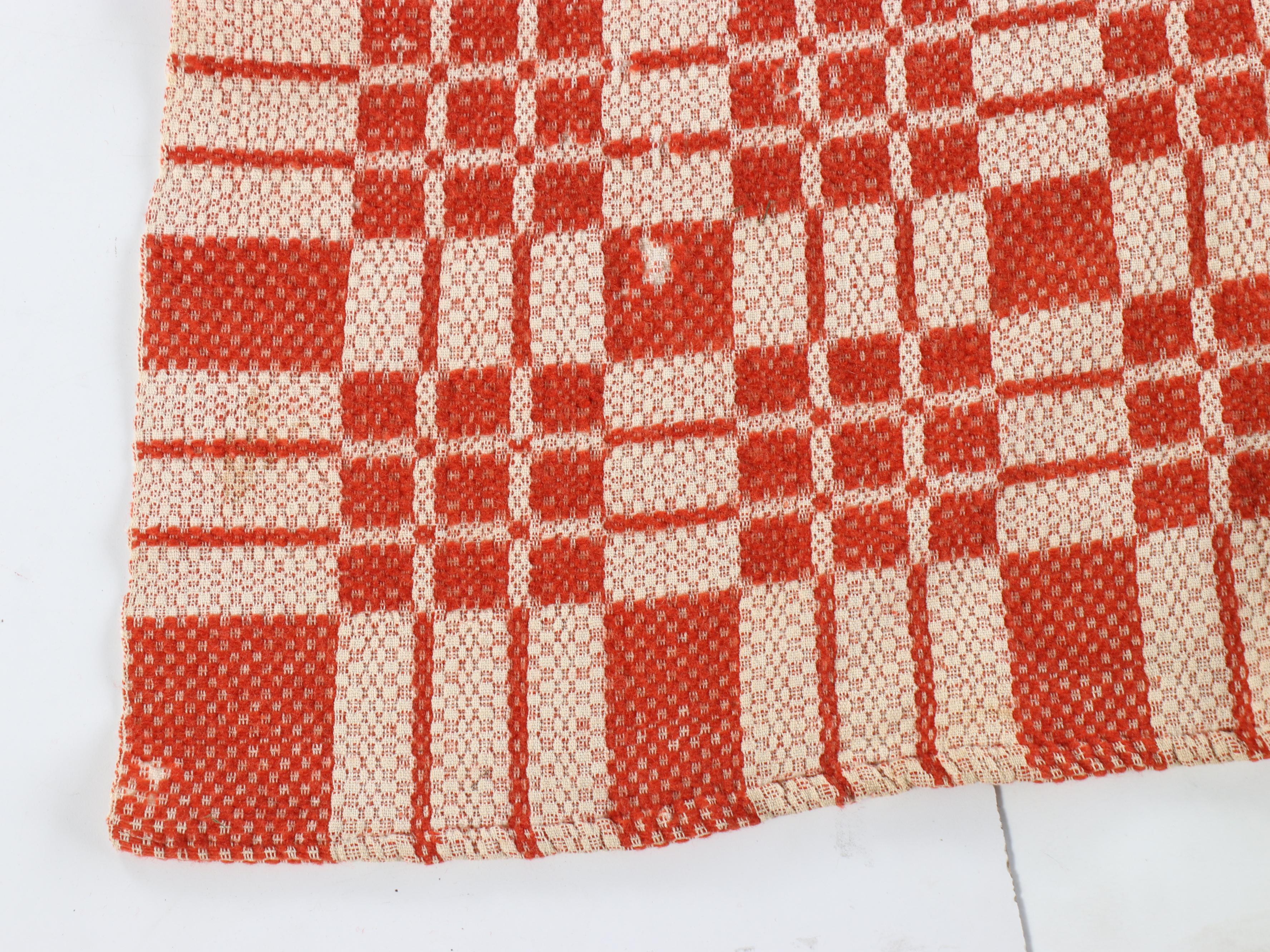 American Colonial Style Oak Quilt Rack with Red and White Woven Coverlet, 20th C