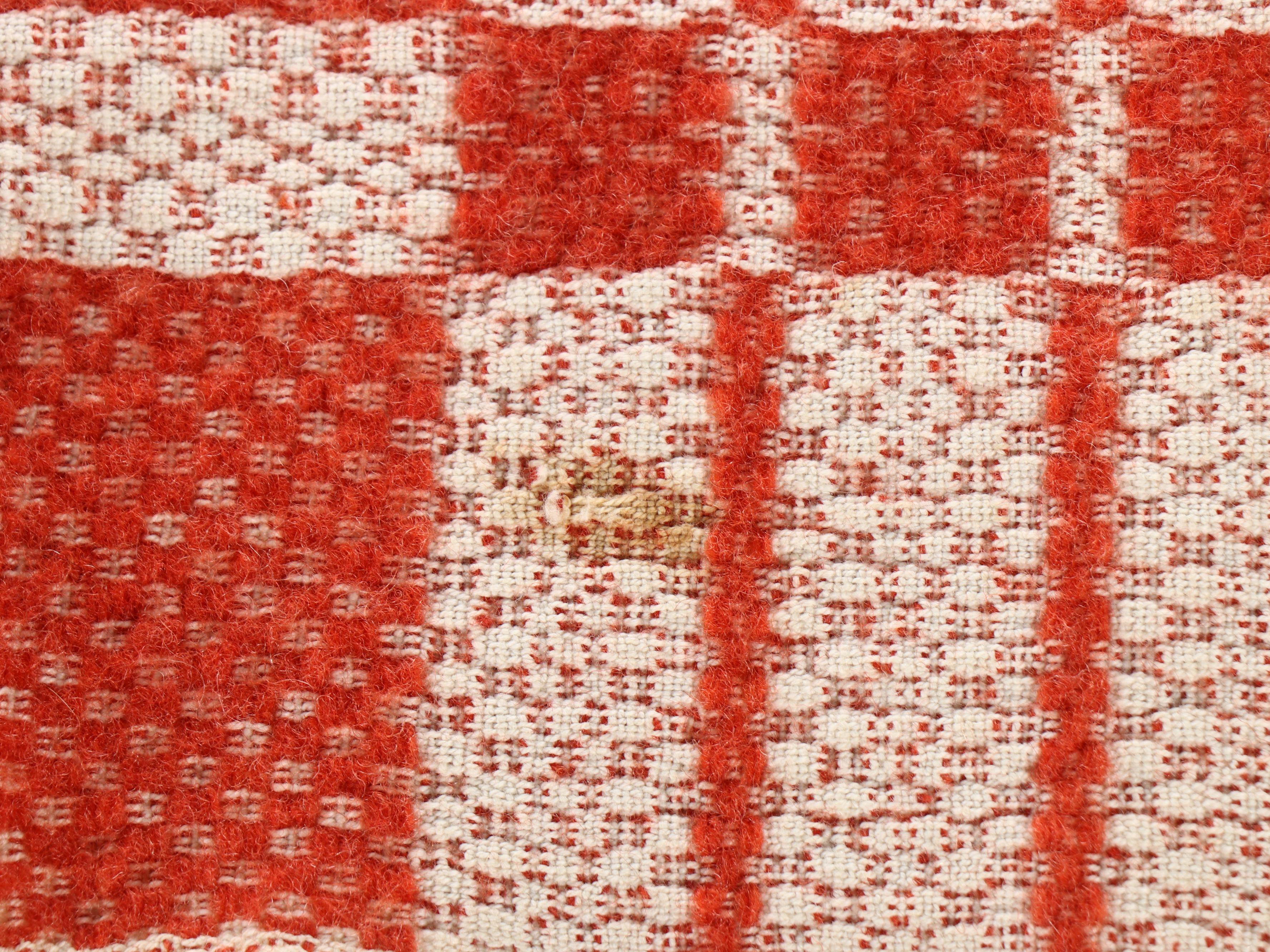 American Colonial Style Oak Quilt Rack with Red and White Woven Coverlet, 20th C