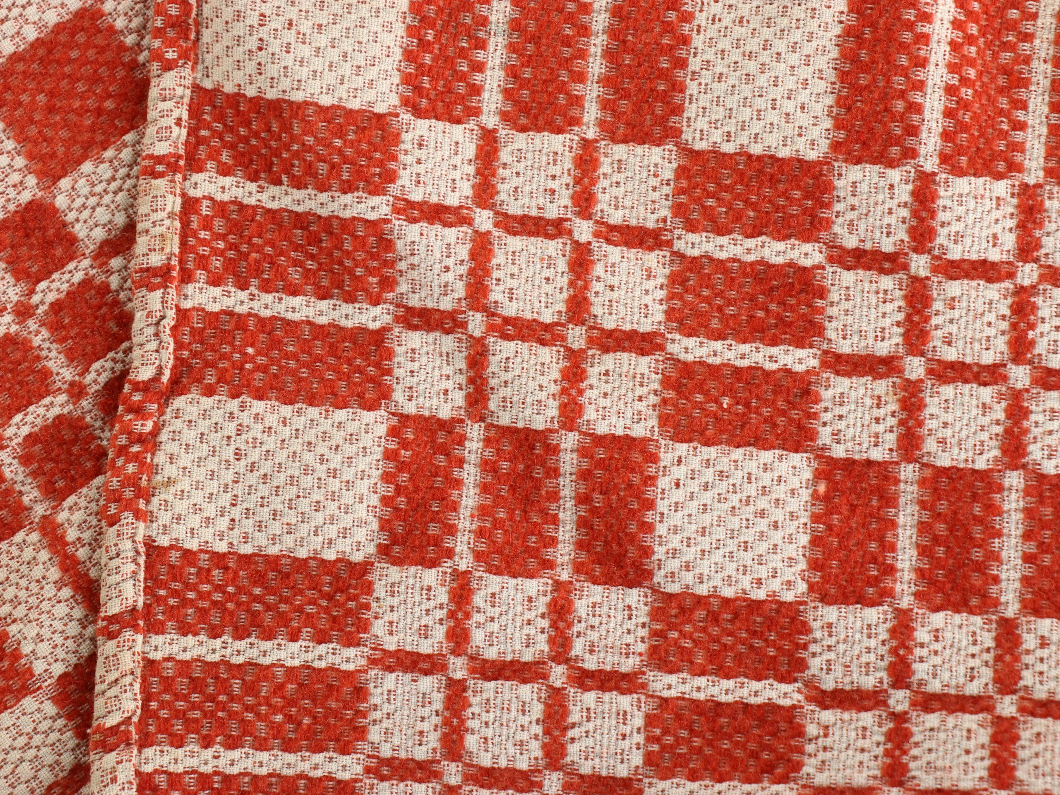 American Colonial Style Oak Quilt Rack with Red and White Woven Coverlet, 20th C