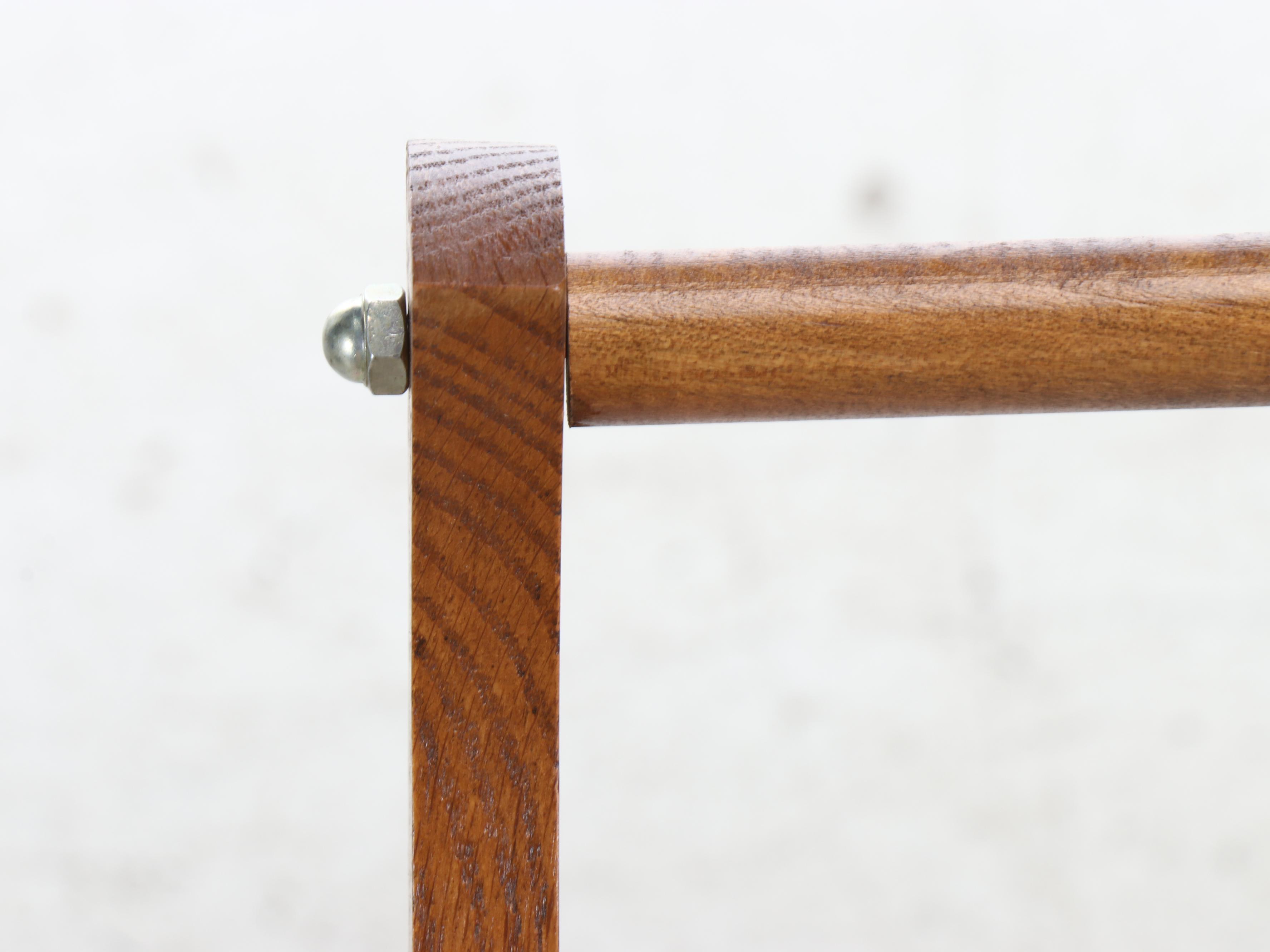 American Colonial Style Oak Quilt Rack with Red and White Woven Coverlet, 20th C