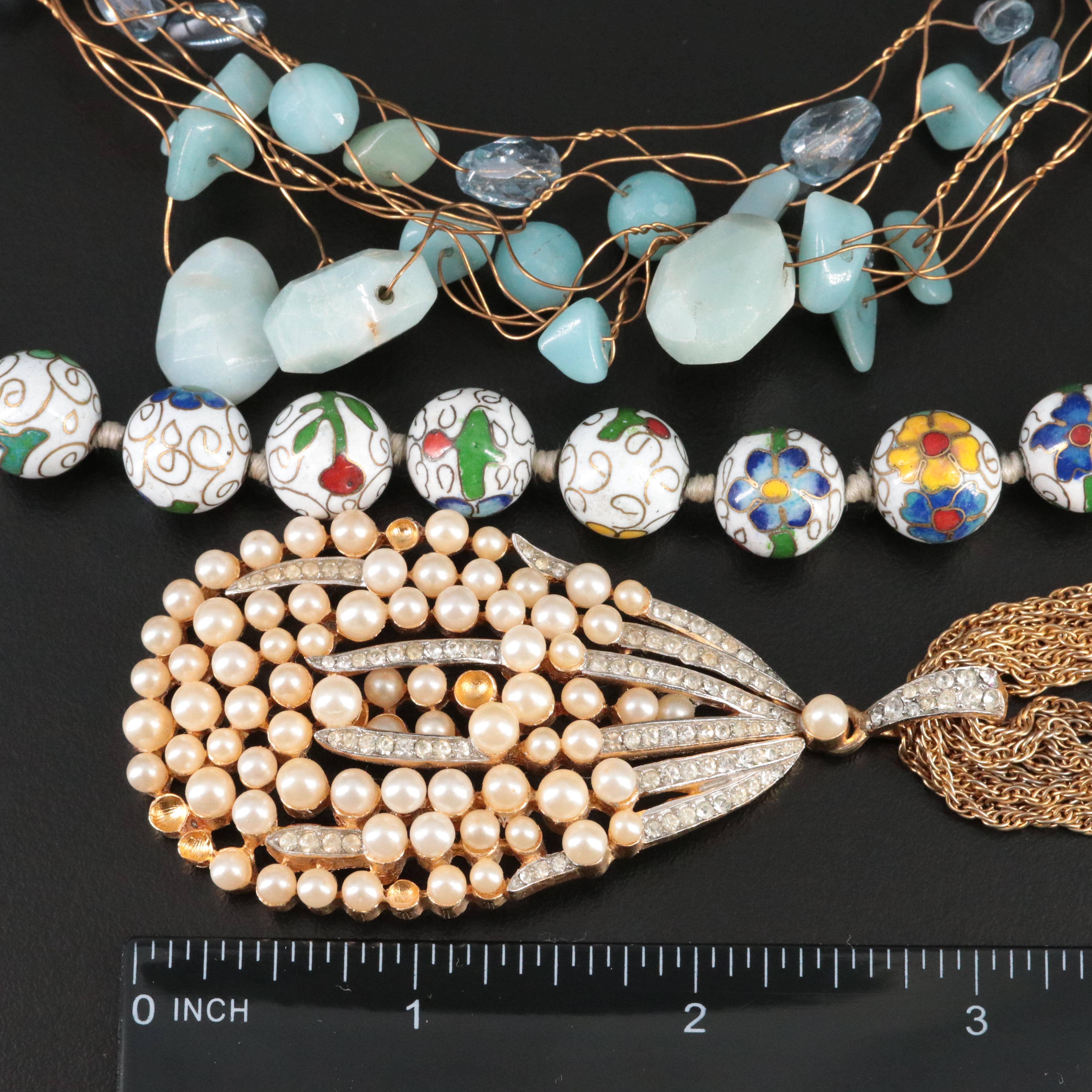 Sterling, Chalcedony and Wrap Bracelets Featured in Necklace Collection