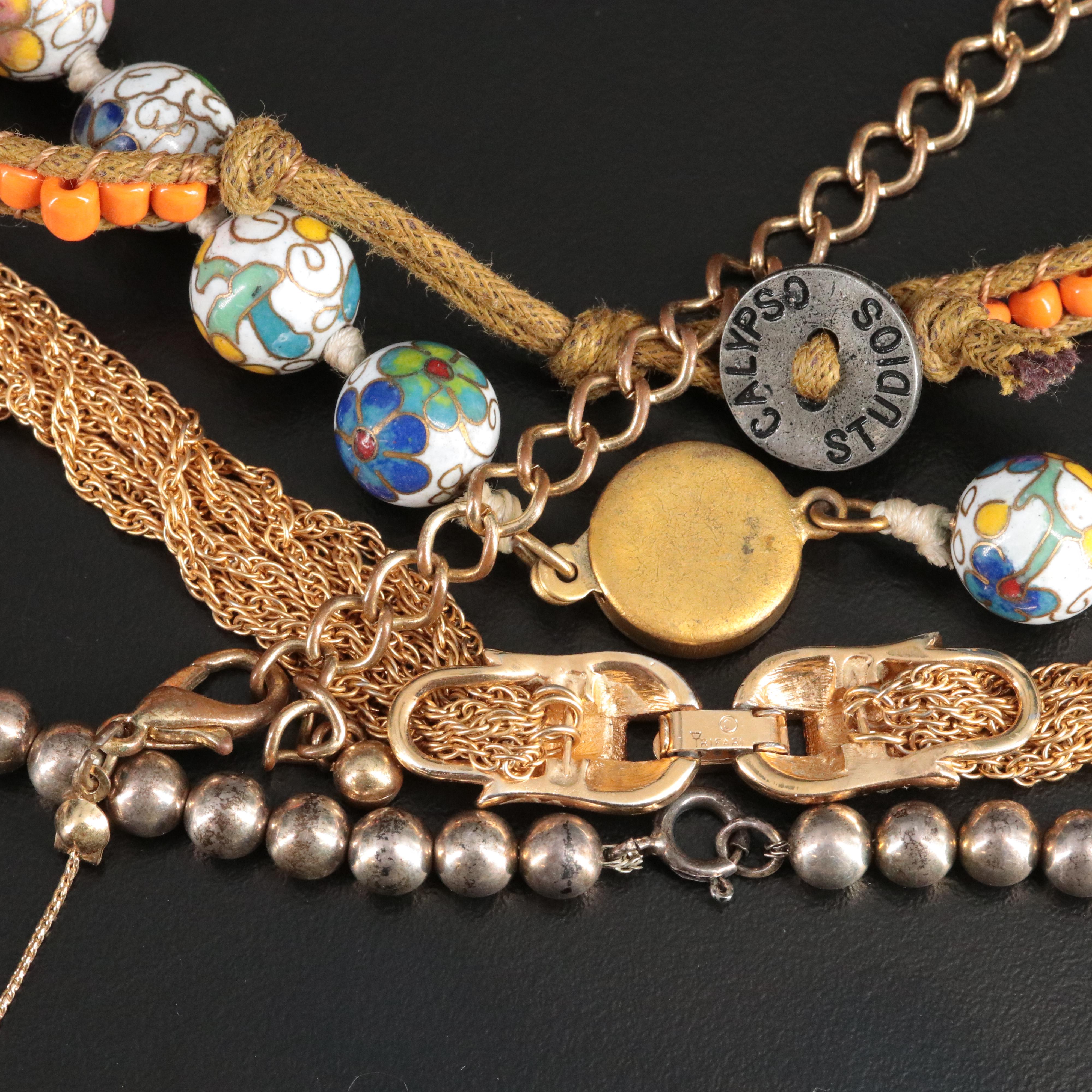 Sterling, Chalcedony and Wrap Bracelets Featured in Necklace Collection