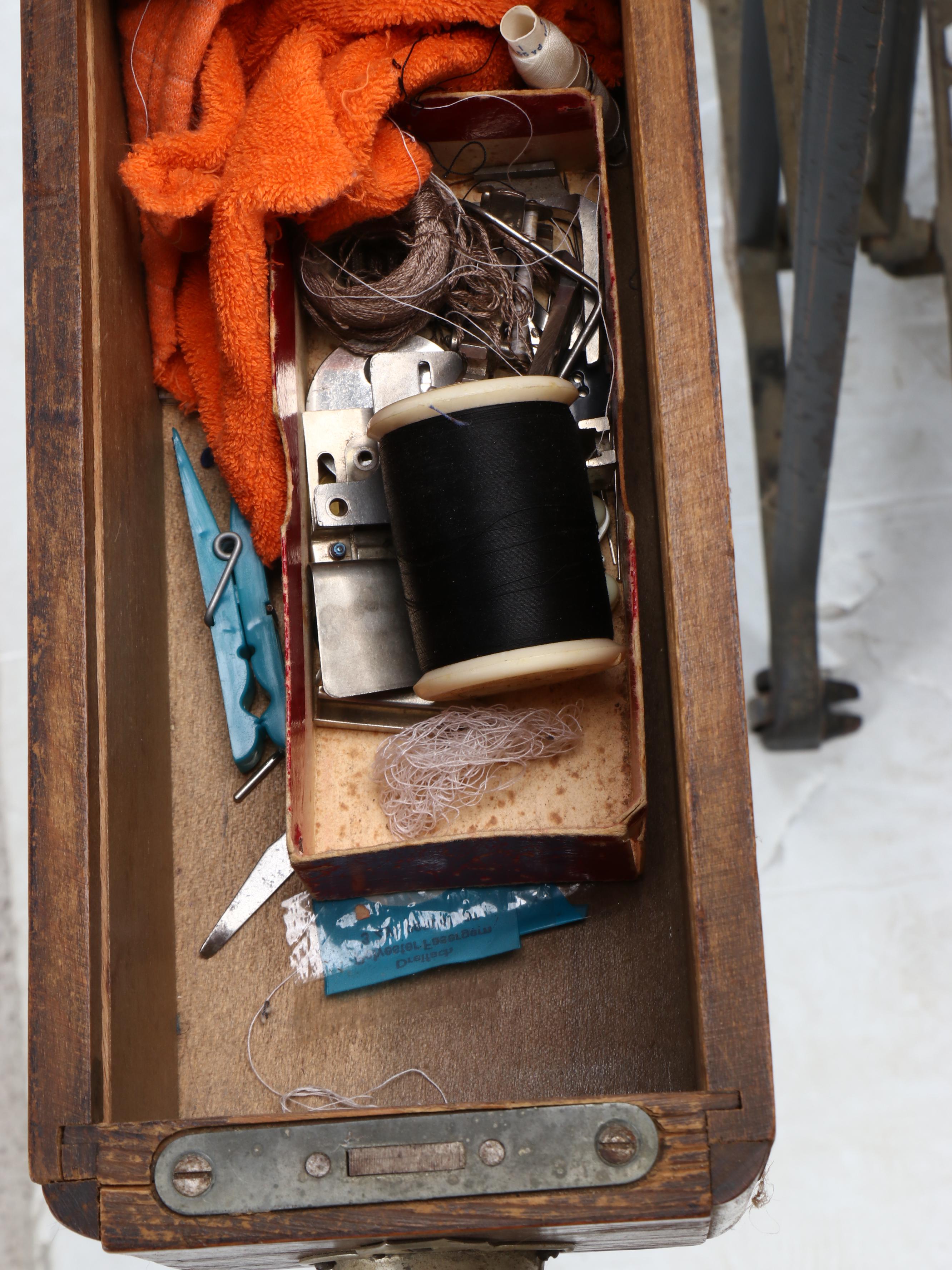 Victoria Sewing Machine with Mahogany Veneer Dome Treadle Table, circa 1906