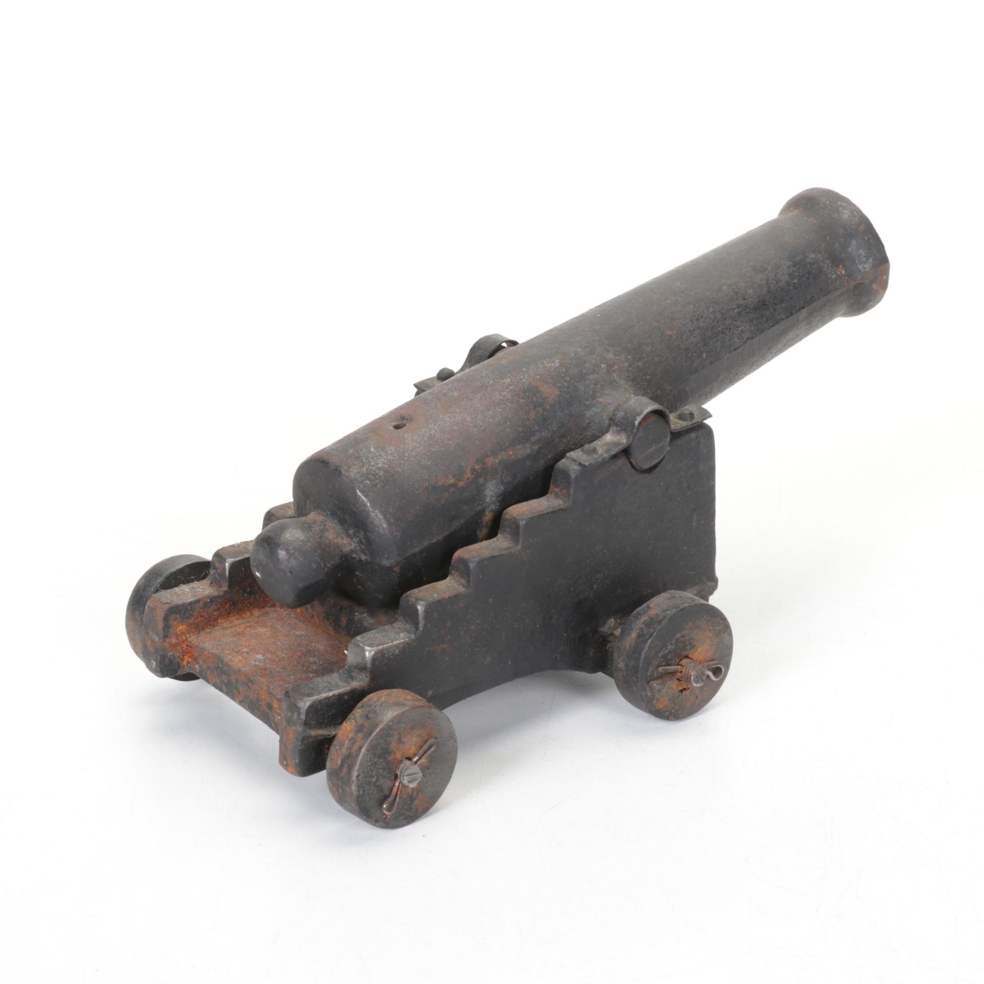 Cast Iron Muzzle Loading Cannon and #52 Red Maserati Race Car