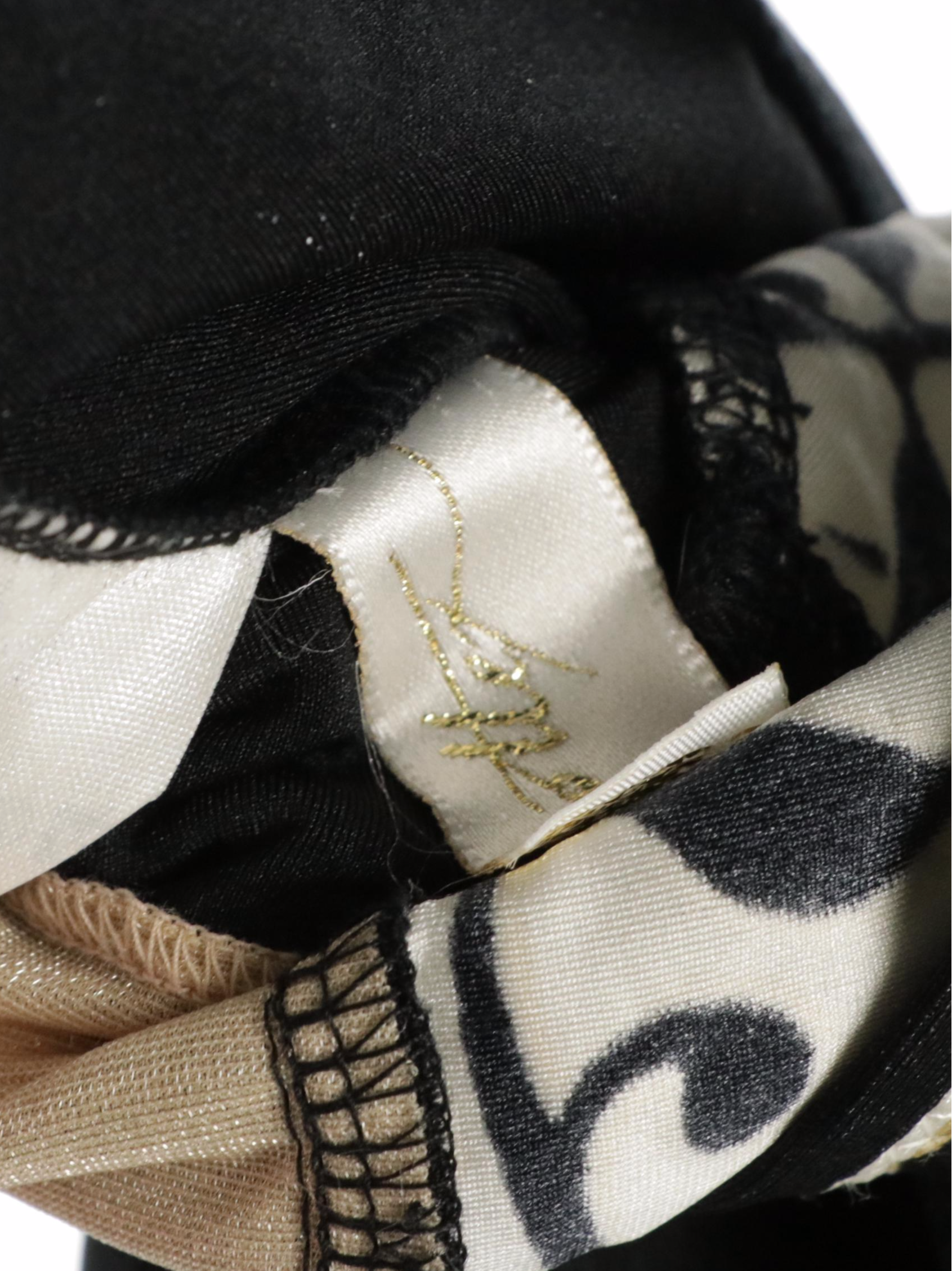 Versace, Lauren Ralph Lauren, and Gottex One-Piece Swimsuits