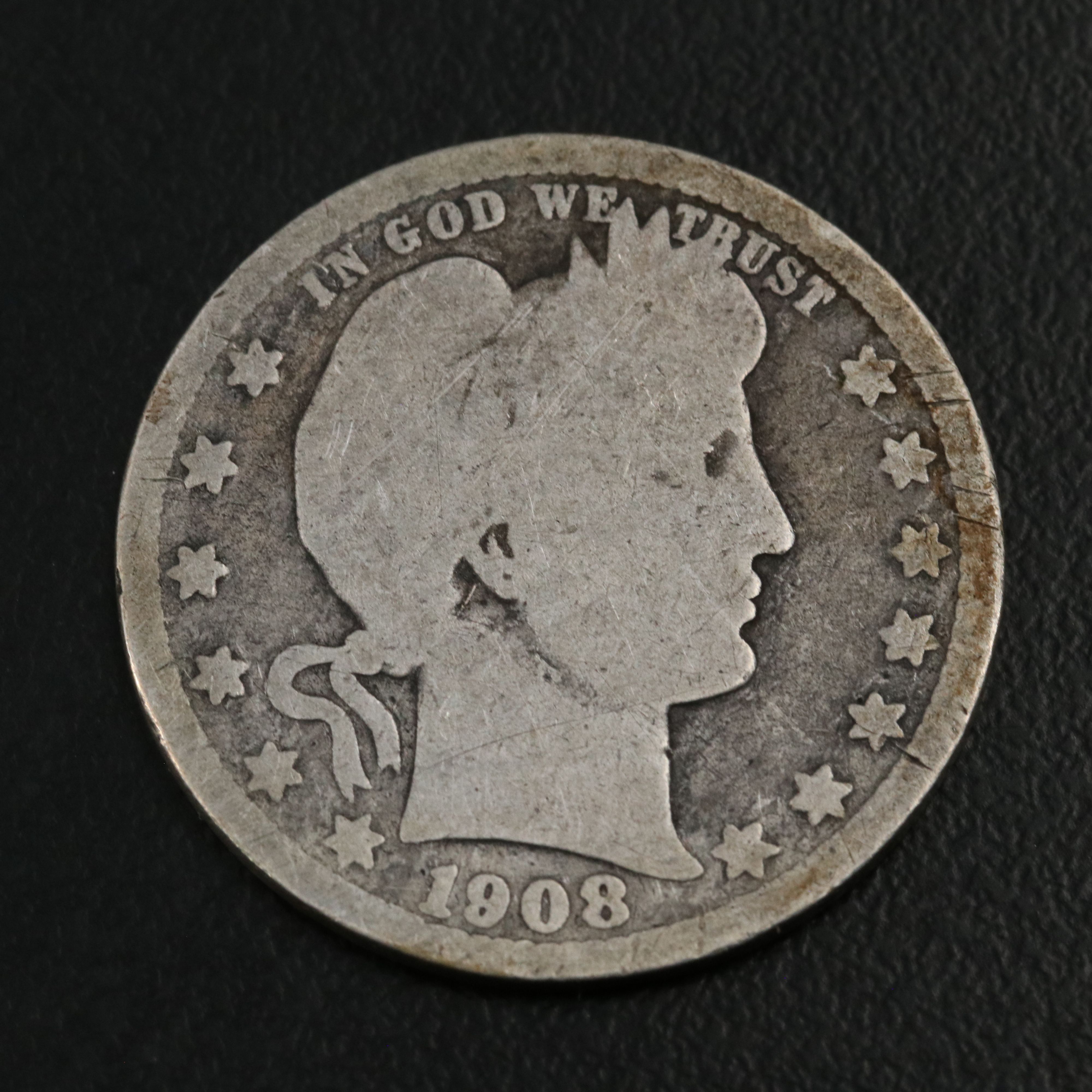 Twenty Standing Liberty Quarters and a 1908-O Barber Quarter