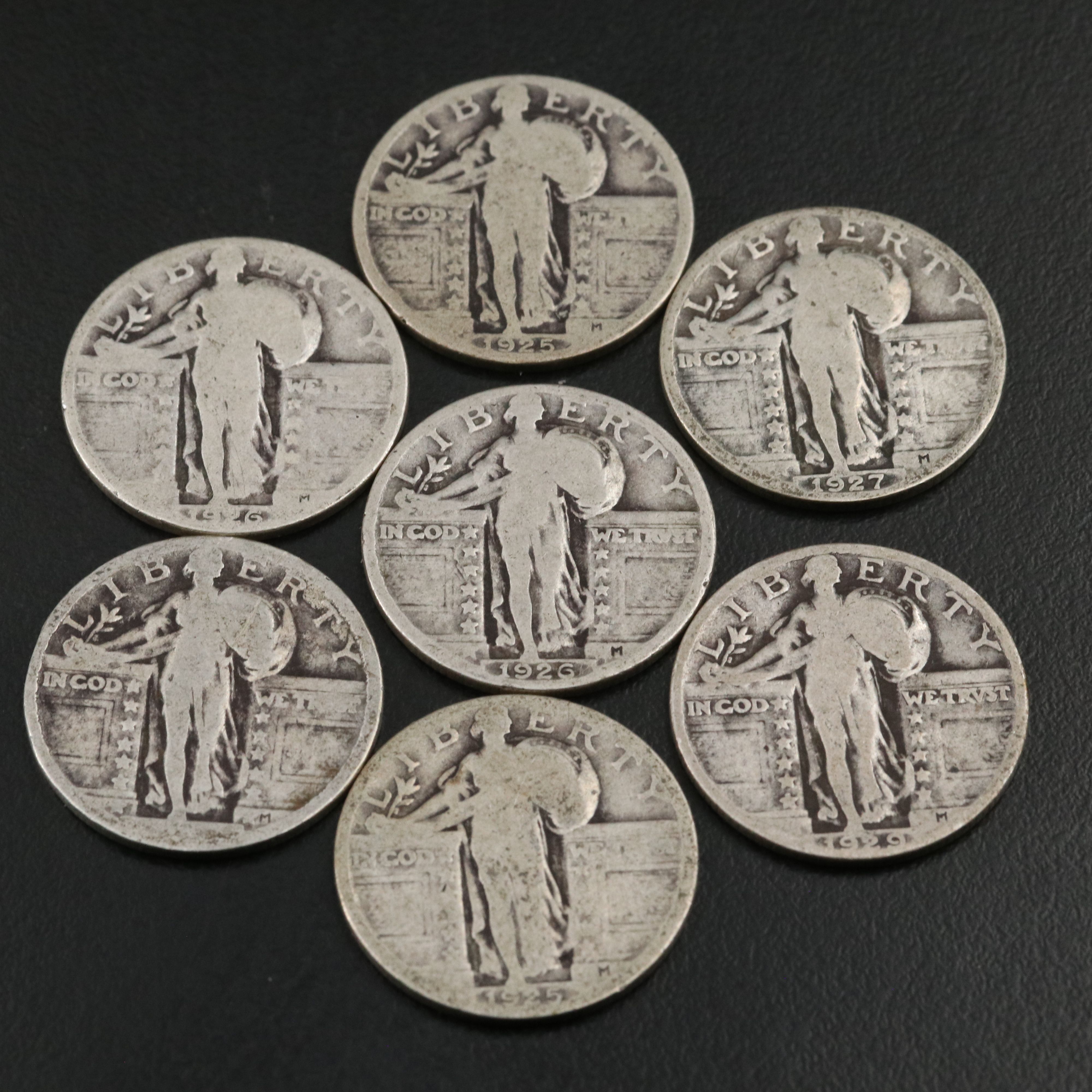 Twenty Standing Liberty Quarters and a 1908-O Barber Quarter