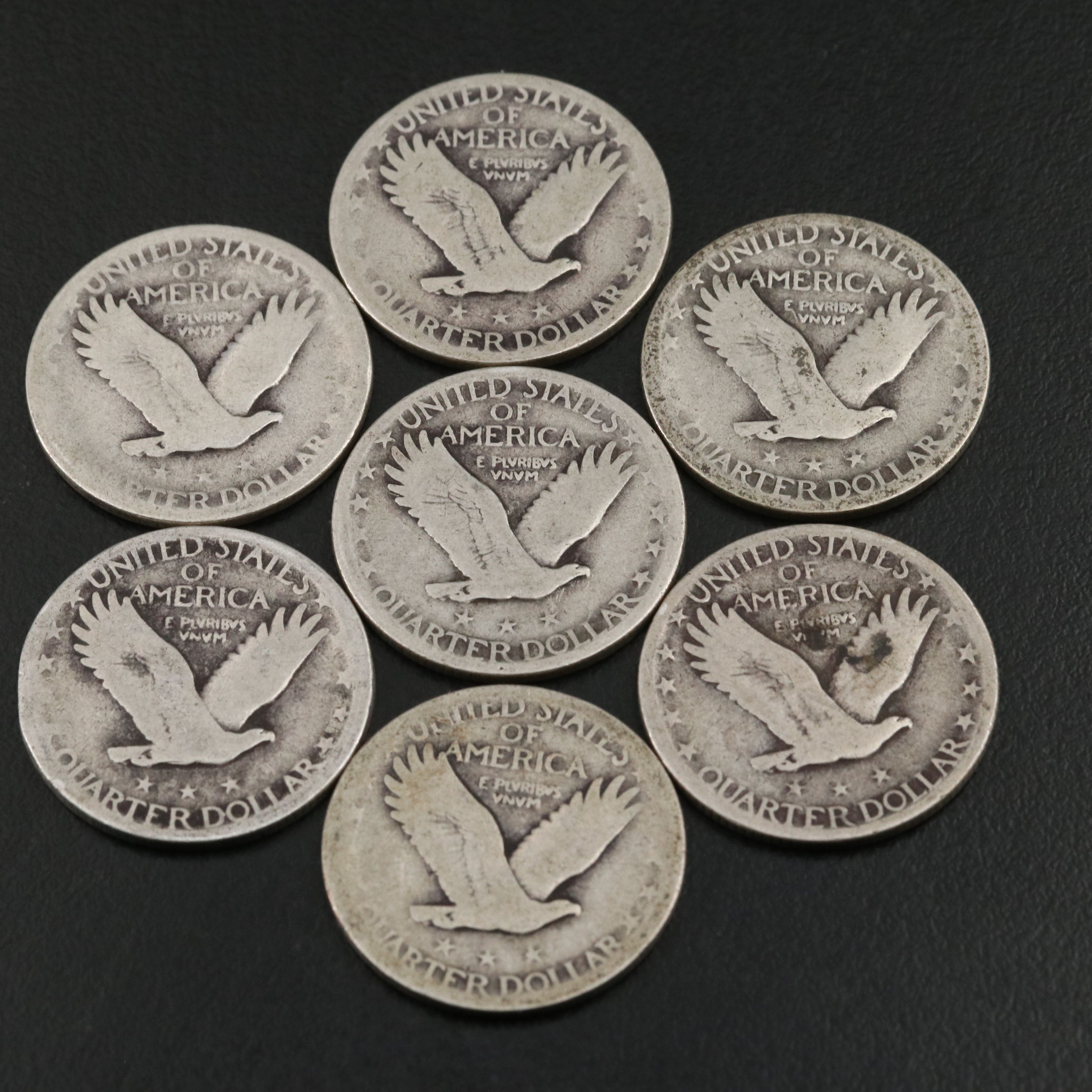 Twenty Standing Liberty Quarters and a 1908-O Barber Quarter