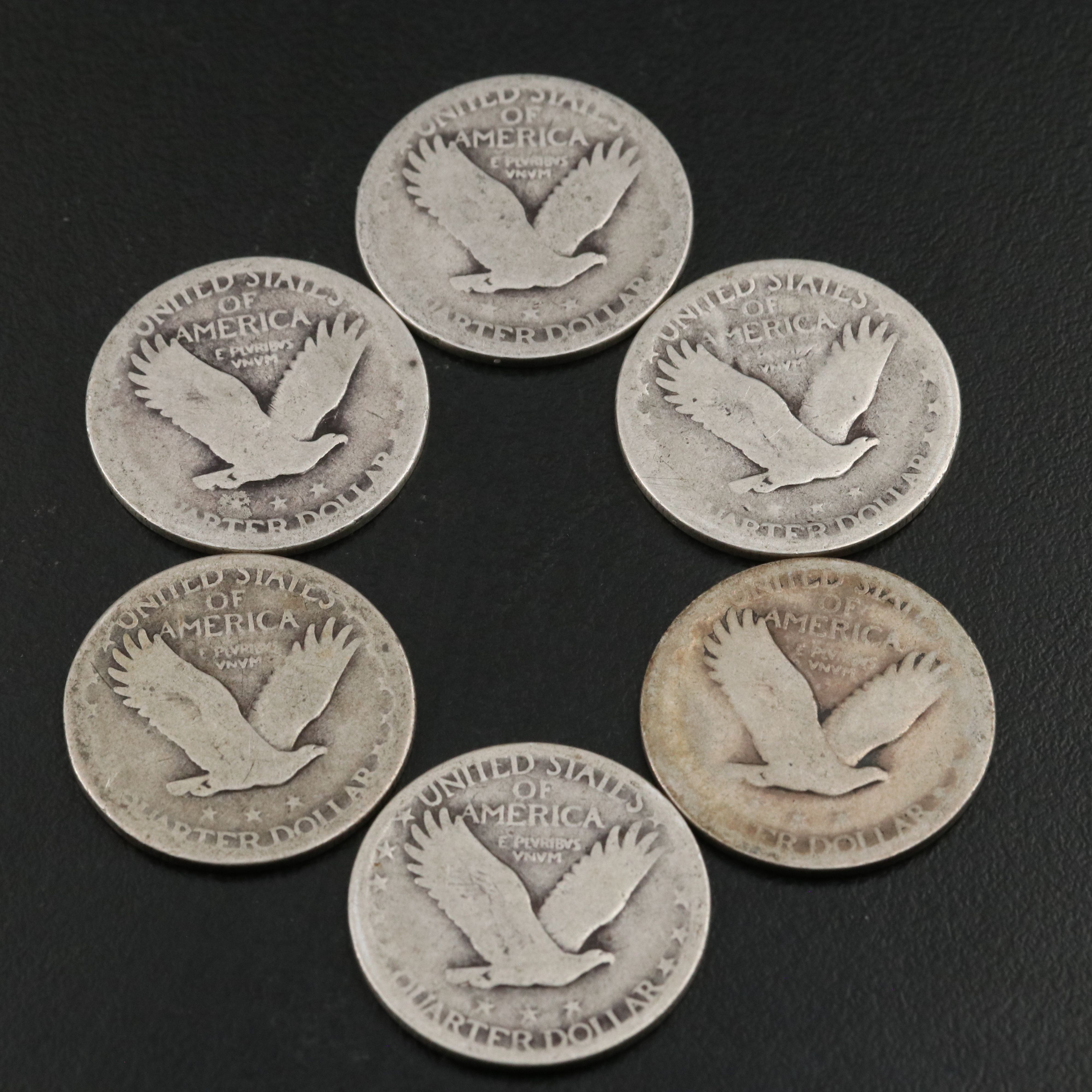 Twenty Standing Liberty Quarters and a 1908-O Barber Quarter