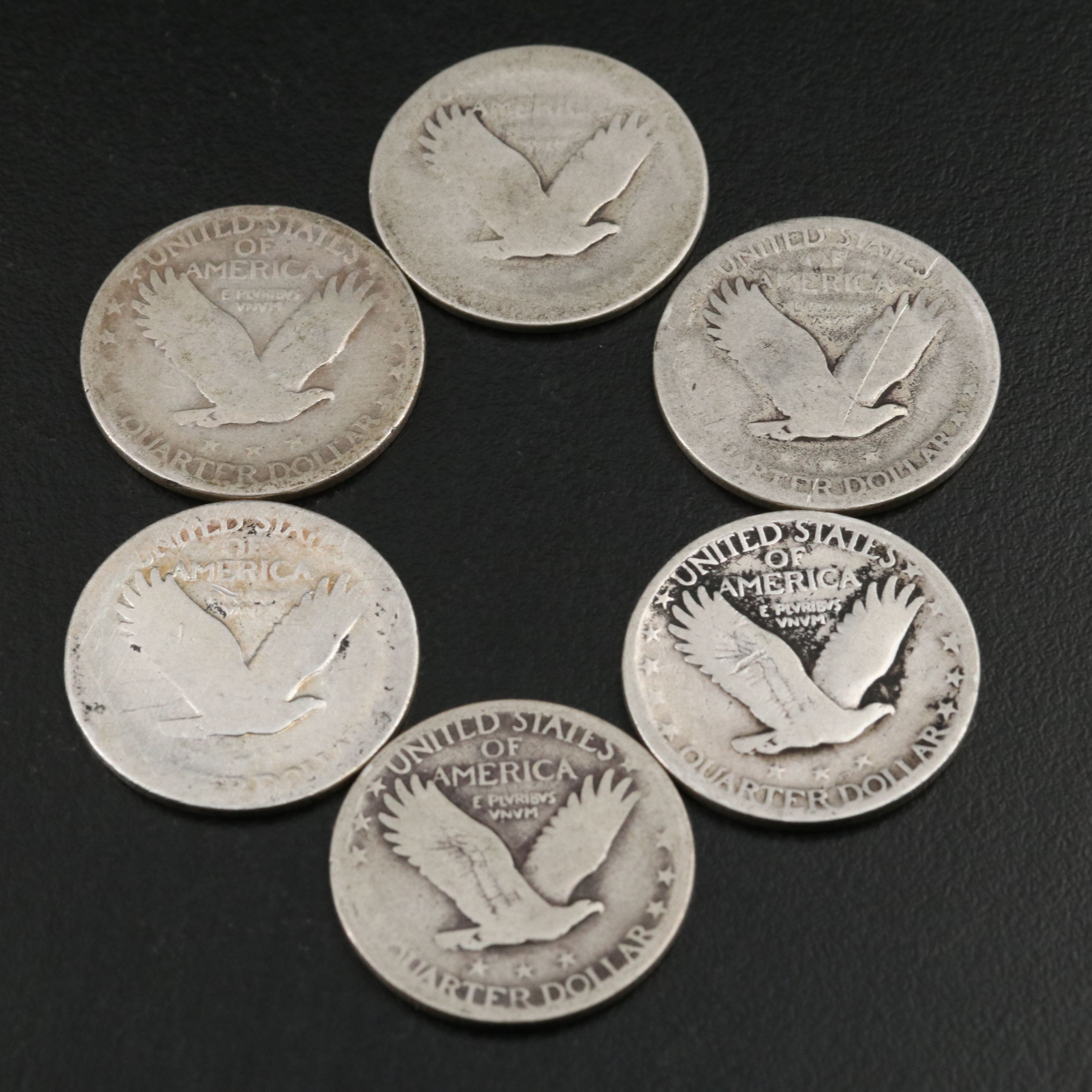 Twenty Standing Liberty Quarters and a 1908-O Barber Quarter