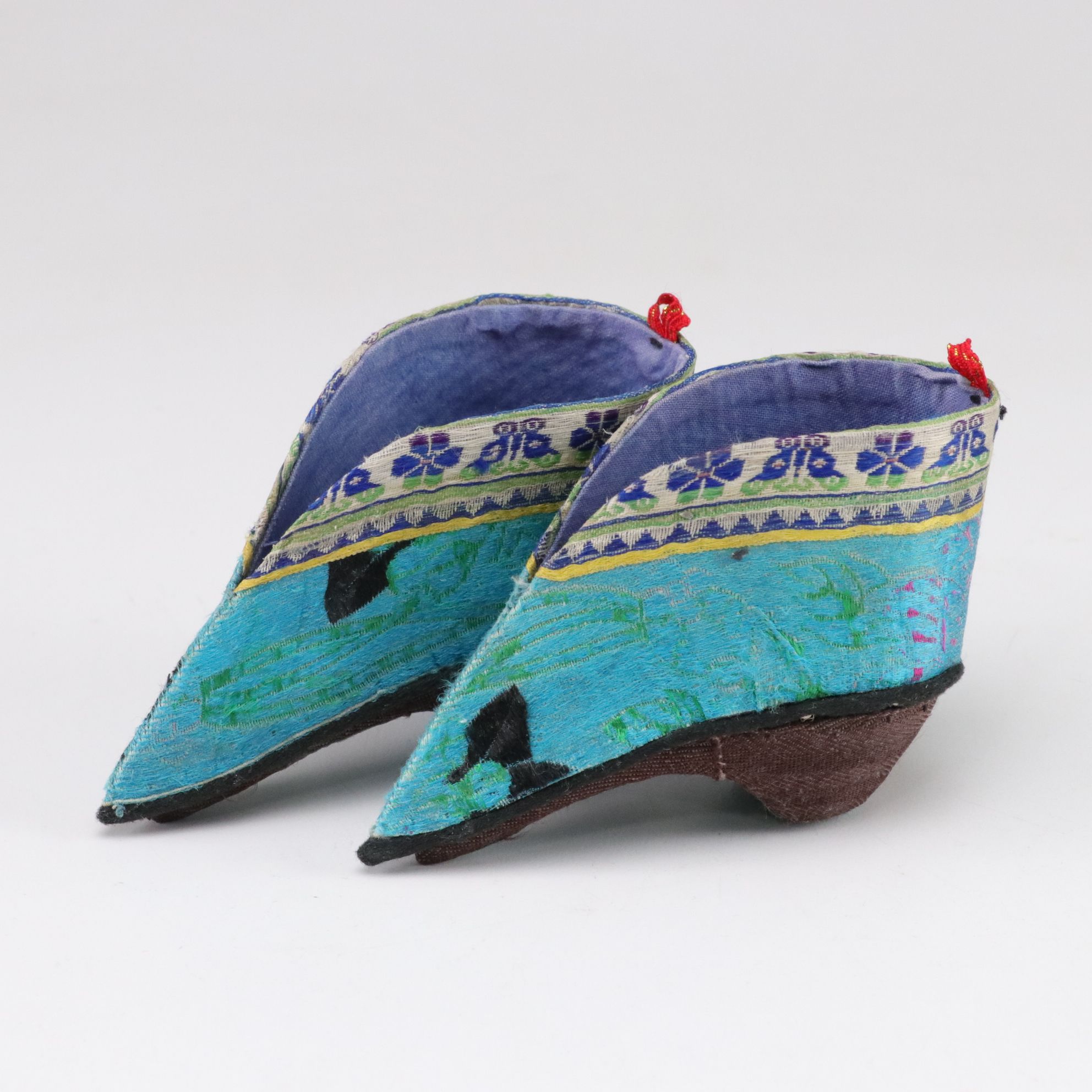 Basket Containing Silk Chinese Shoes, Baby Bonnet, Linens and More