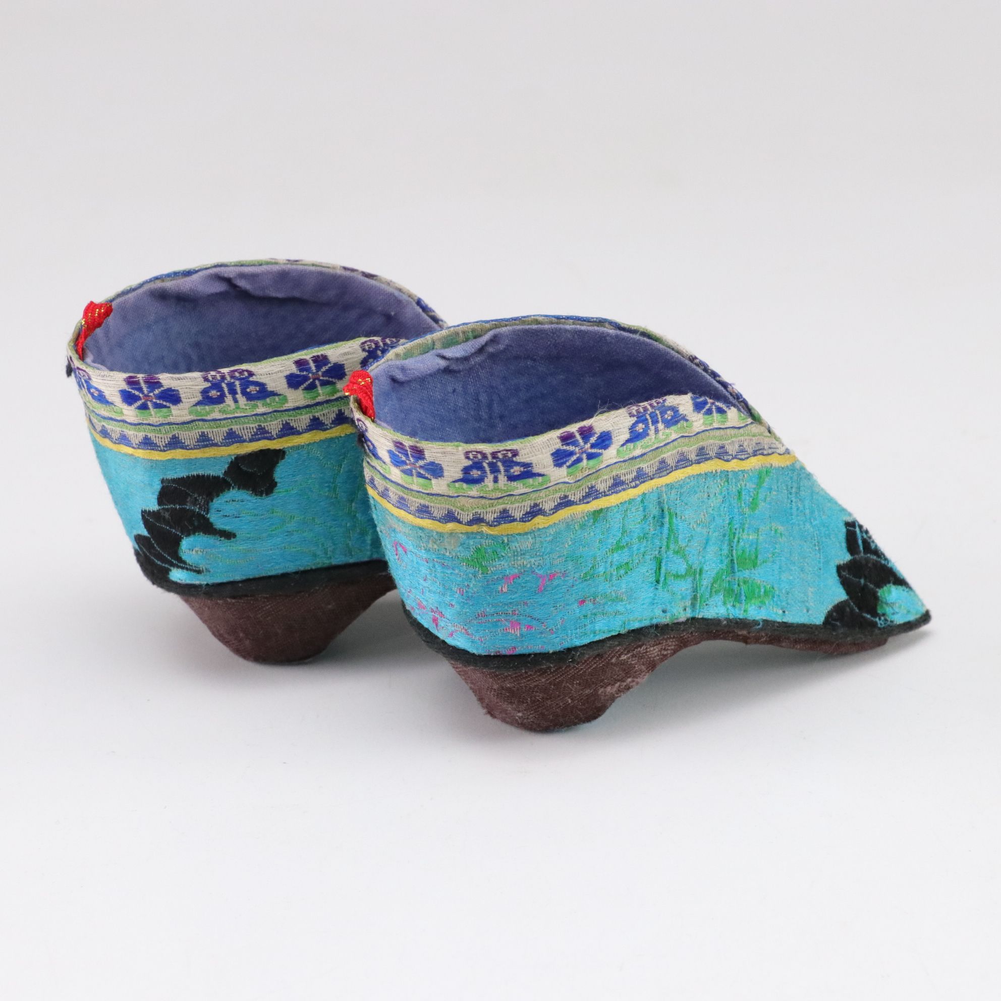 Basket Containing Silk Chinese Shoes, Baby Bonnet, Linens and More